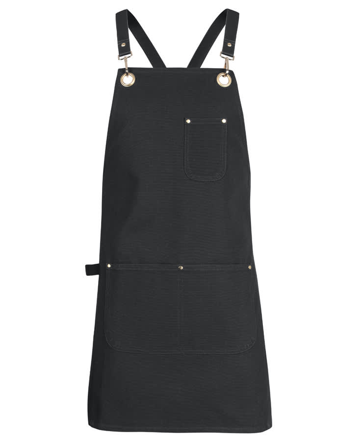 A black canvas apron with brass eyelets and a pocket, featuring adjustable PU straps. JB's 65x75 Brass Eyelet Canvas Apron Pu Strap - Image 1
