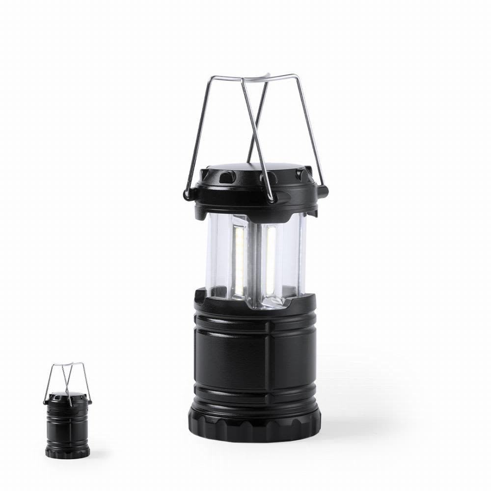 A portable black lantern with a transparent casing and a handle, featuring two bright LED lights inside. Demil - Image 1