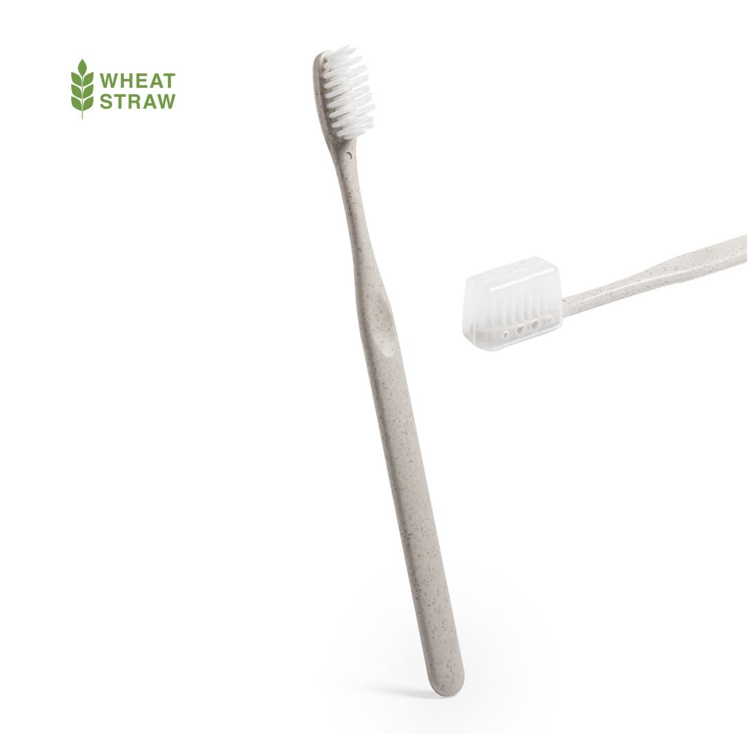 A toothbrush made from wheat straw, featuring a grey handle and white bristles. It includes a logo. Cleidol Toothbrush - Image 1