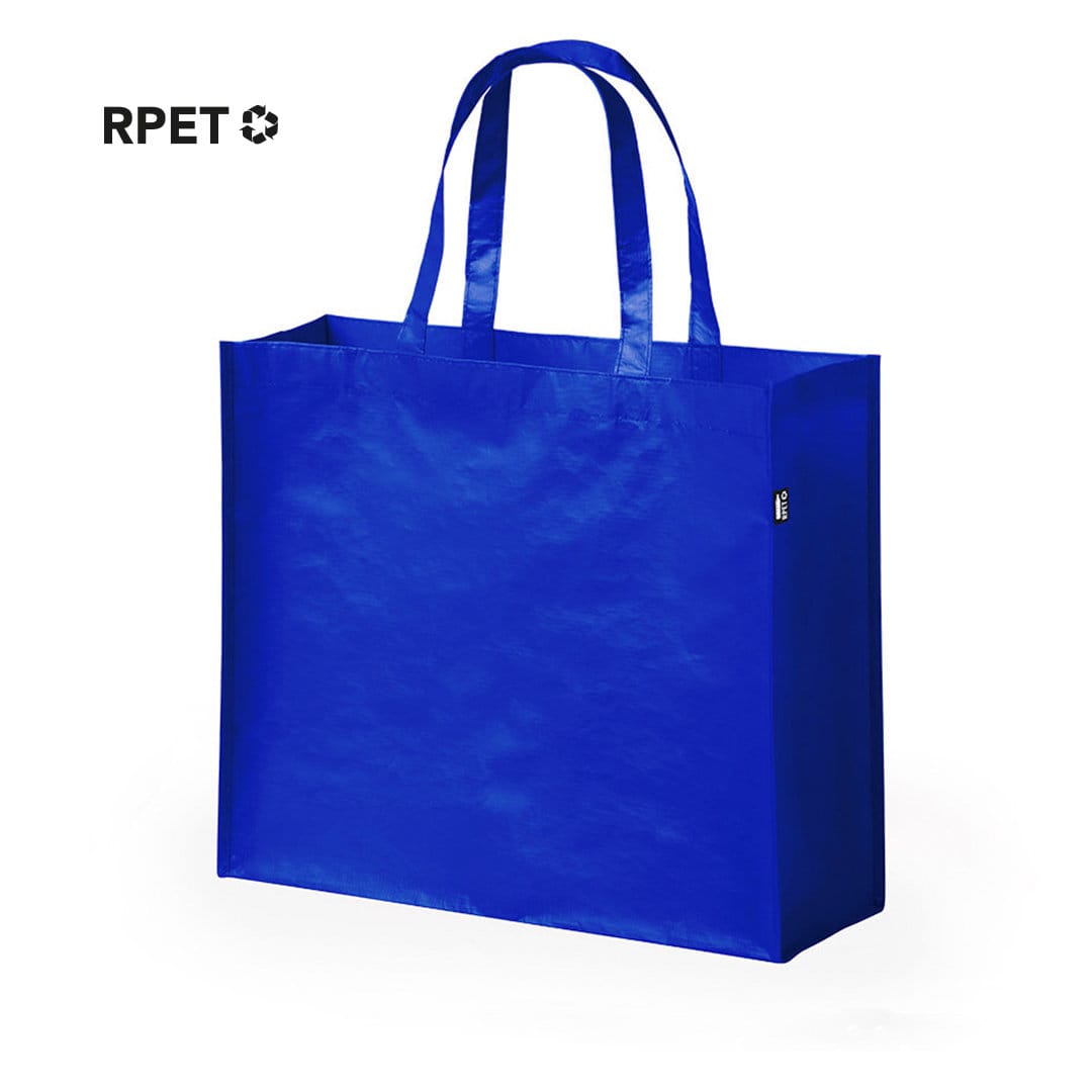 A blue reusable grocery bag with two sturdy handles and a logo on the side. Made from RPET material. Kaiso Bag - Image 1