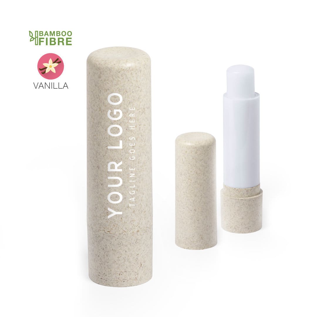 A cylindrical lip balm with a bamboo fibre container, featuring a white stick and a subtle vanilla scent. Fledar Lip Balm - Image 1