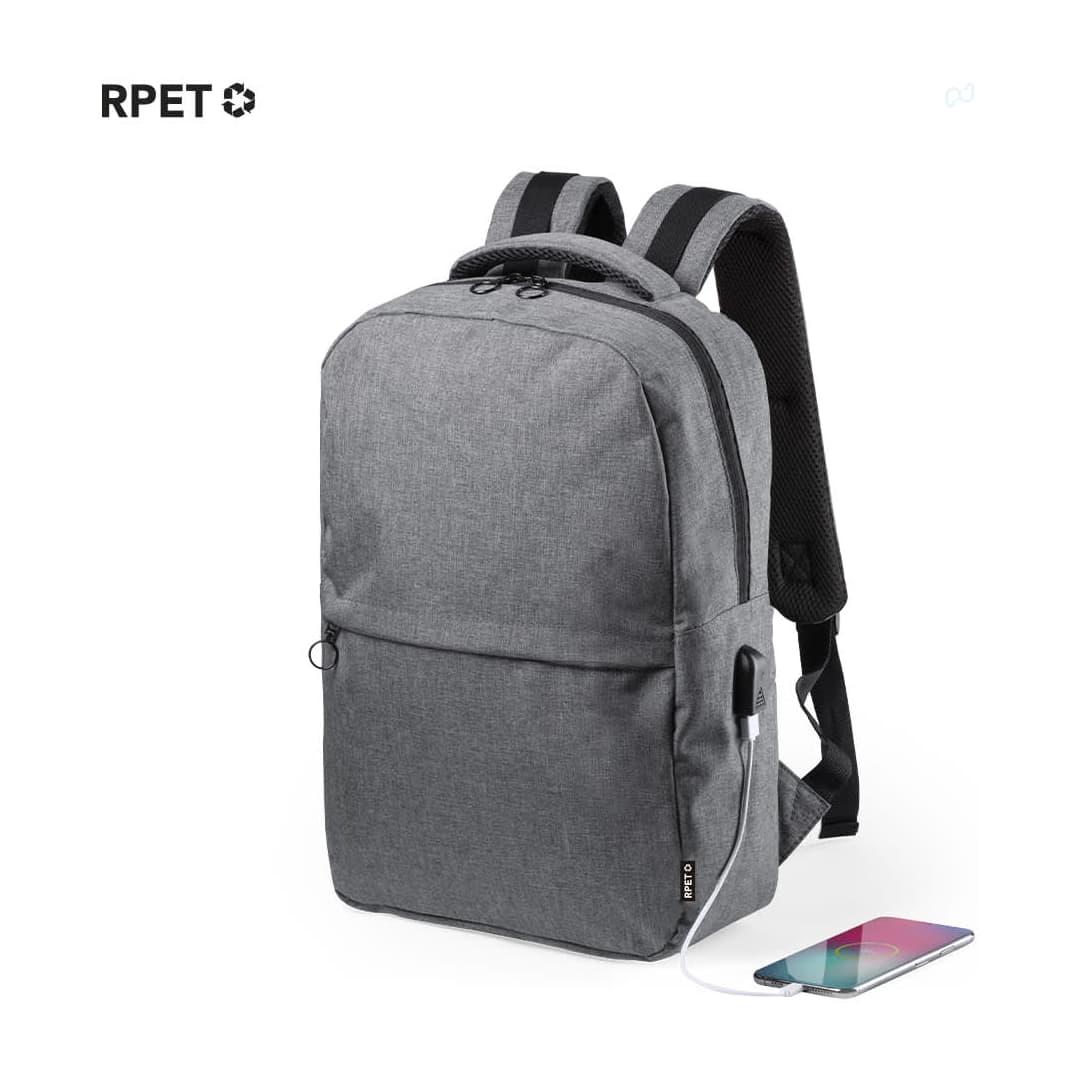 A grey laptop backpack with a front pocket, adjustable straps, and a built-in charger port. Konor Backpack - Image 1