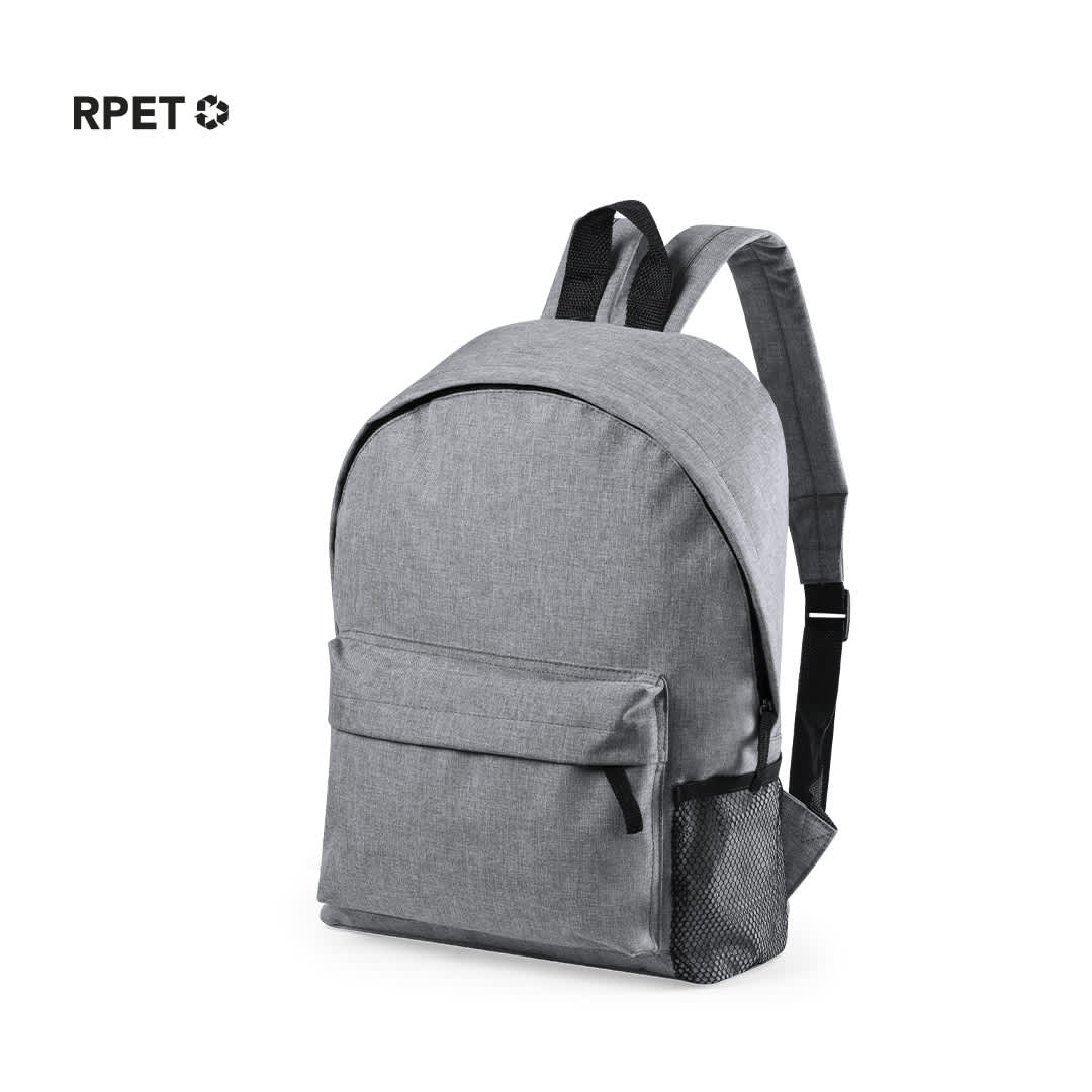 A grey backpack featuring a front pocket and a side mesh pocket. It has adjustable straps and a logo. Caldy Backpack - Image 1