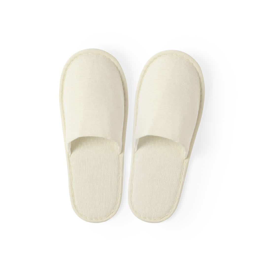 A pair of cream-coloured Nalton slippers with an open toe design, featuring a simple and comfortable style. Nalton Slippers - Image 1