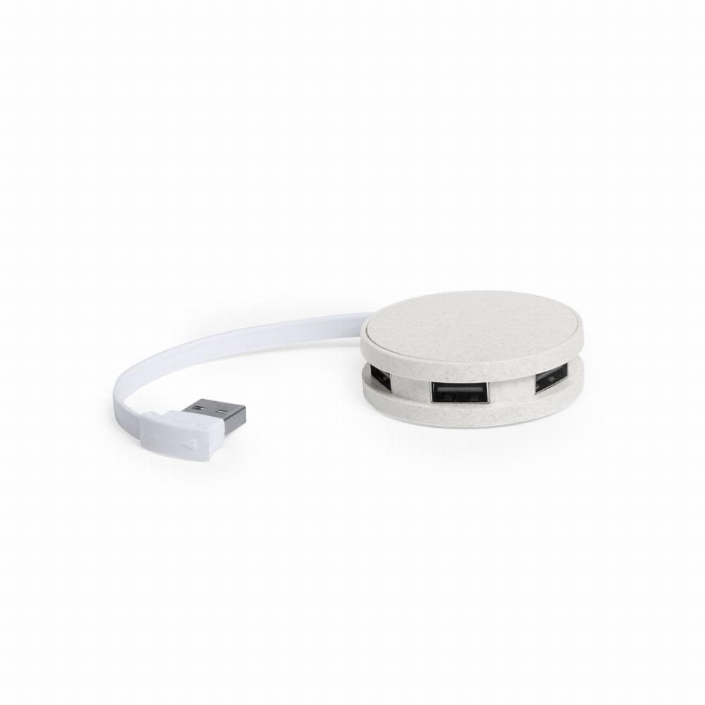 A round, white USB hub with multiple ports and a connected white cable. It has a smooth, textured finish. Brunox - Image 1