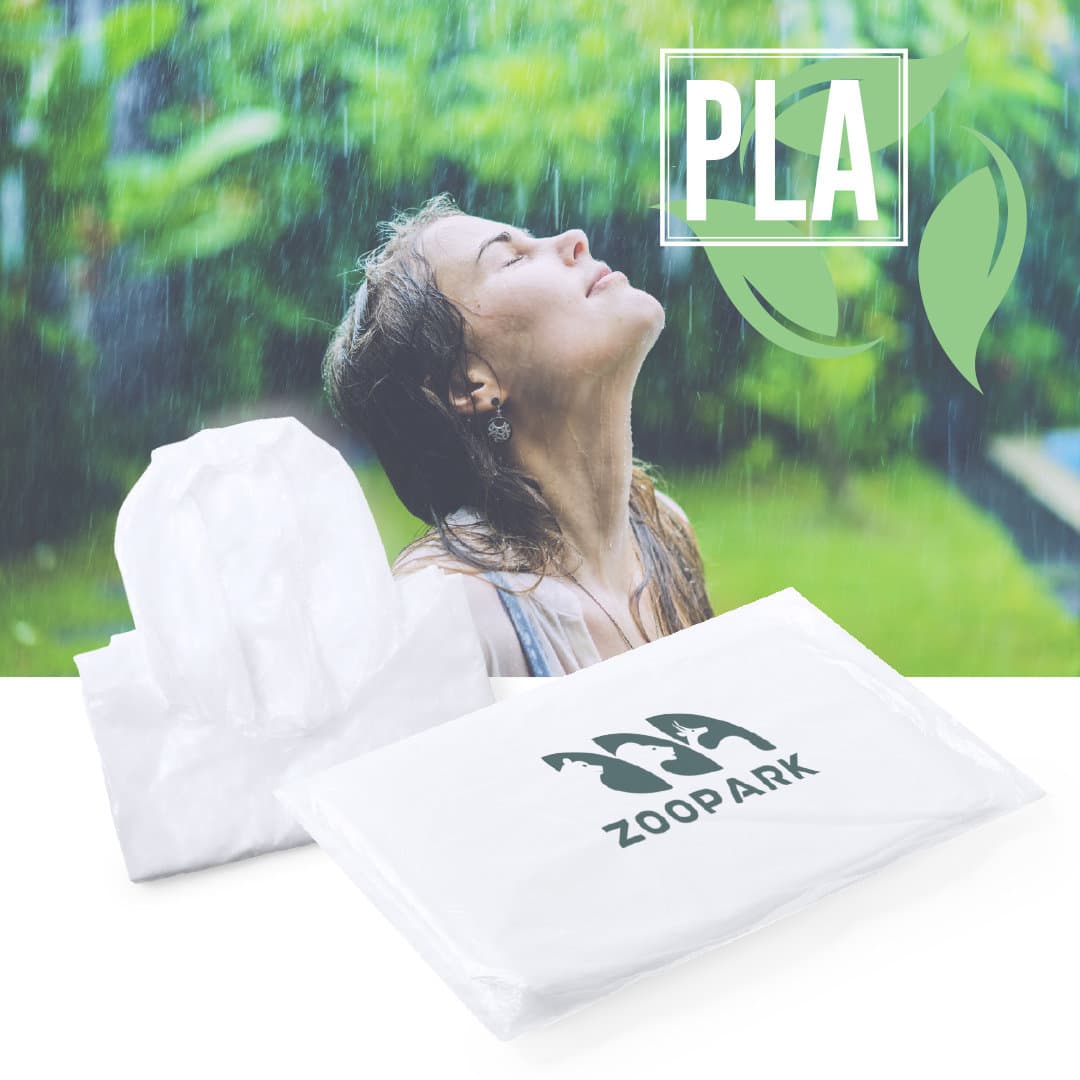 A white raincoat package with a logo, beside a person enjoying the rain outdoors. Reizon Raincoat - Image 1