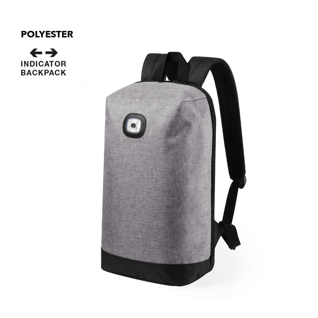 A grey backpack with a black bottom, featuring a logo on the front and shoulder straps. Krepak Indicator Backpack - Image 1