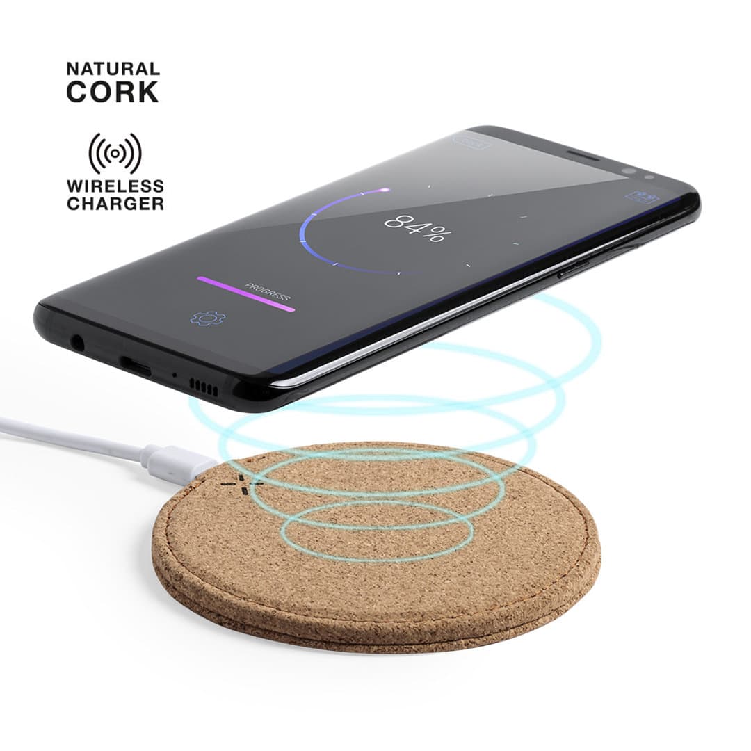 A wireless charger with a natural cork surface and a smartphone above it, displaying charging indicators. Kibox Charger - Image 1
