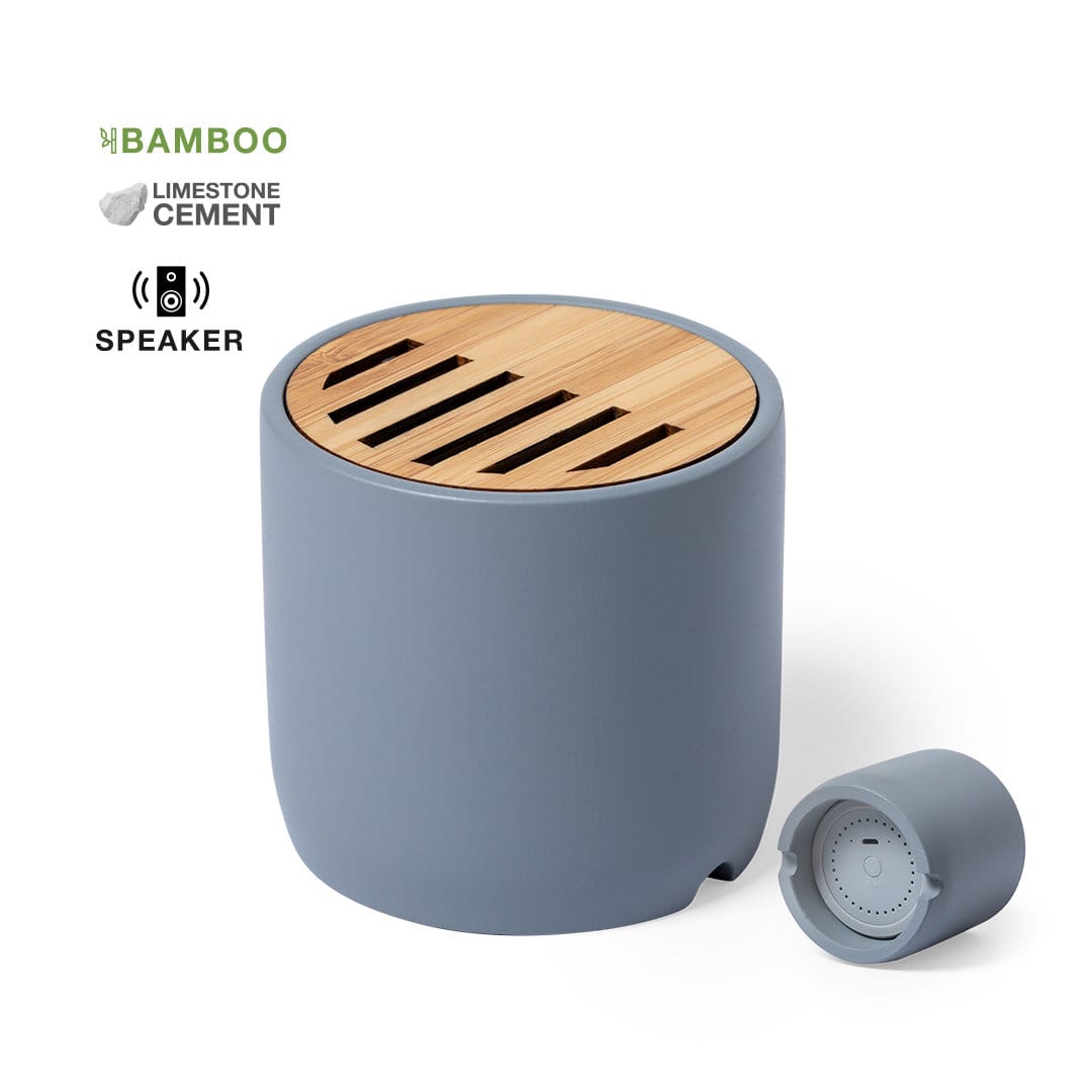 A round, grey speaker made of limestone cement with a bamboo top. Compact design with a detachable section. Piler Speaker - Image 1