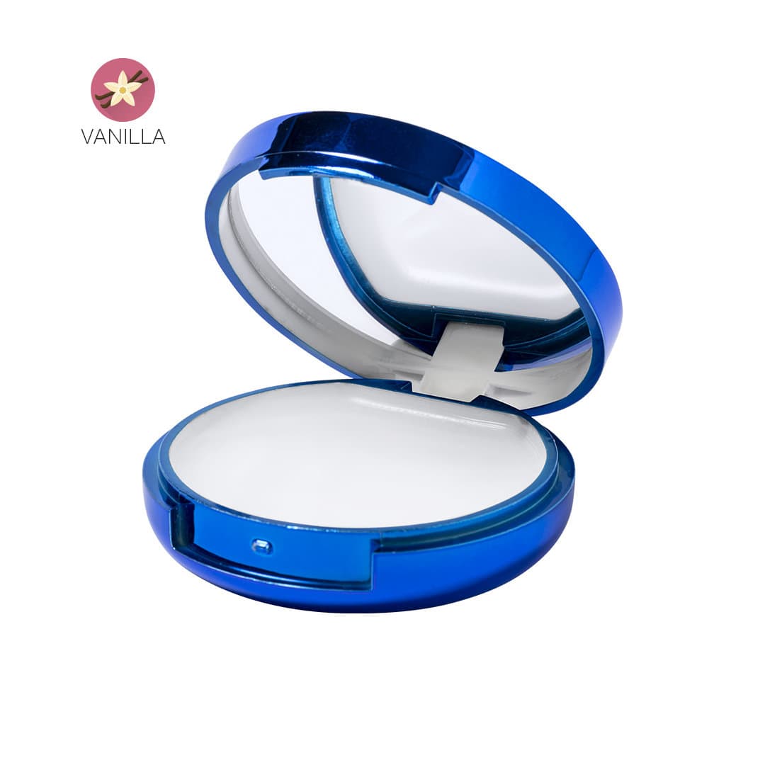 A blue mirrored compact with a white interior, featuring a snap closure. It has a branding logo on the top. Zendal Lip Balm - Image 1