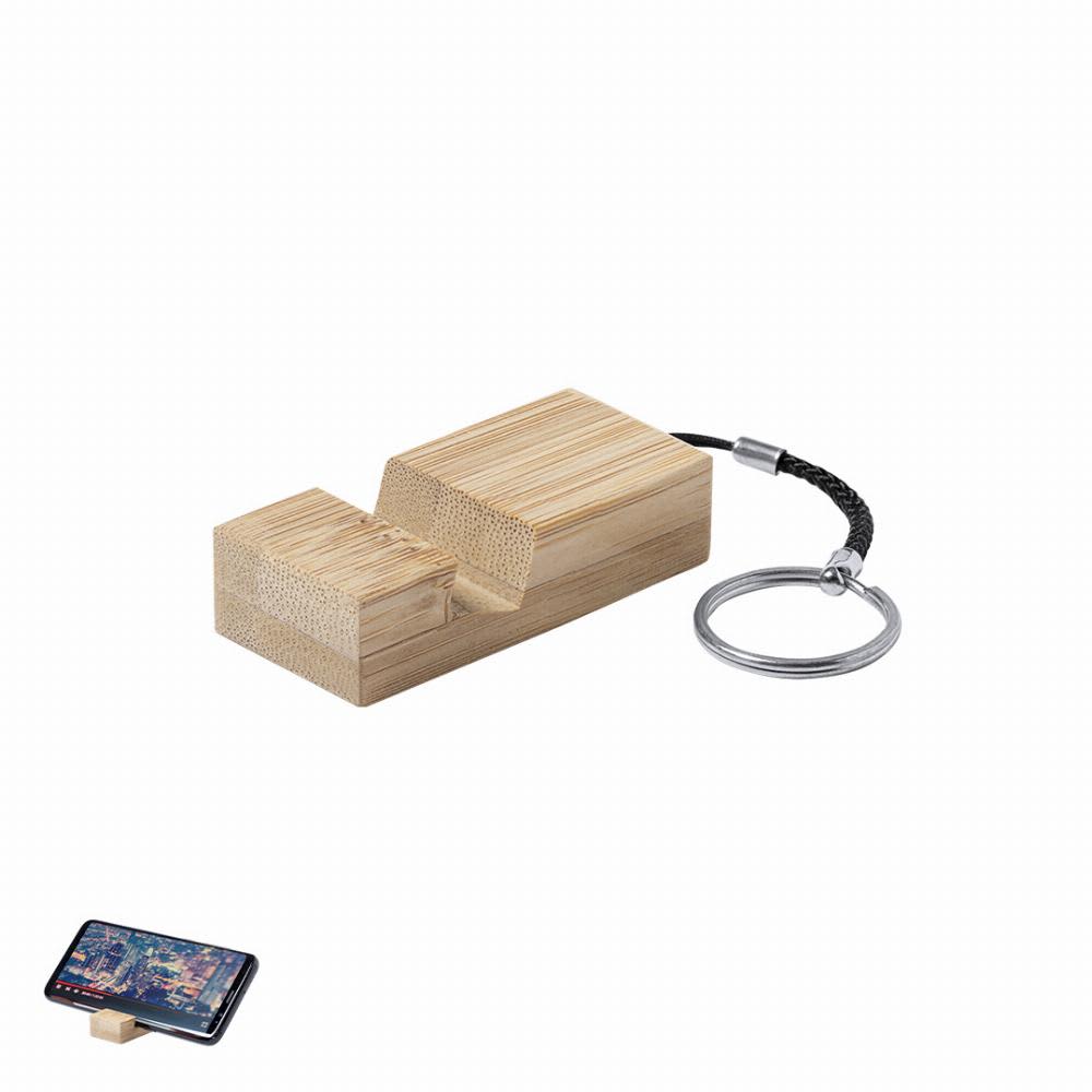 A bamboo phone holder with a metal keychain, designed to support a smartphone at an angle. Maros - Image 1