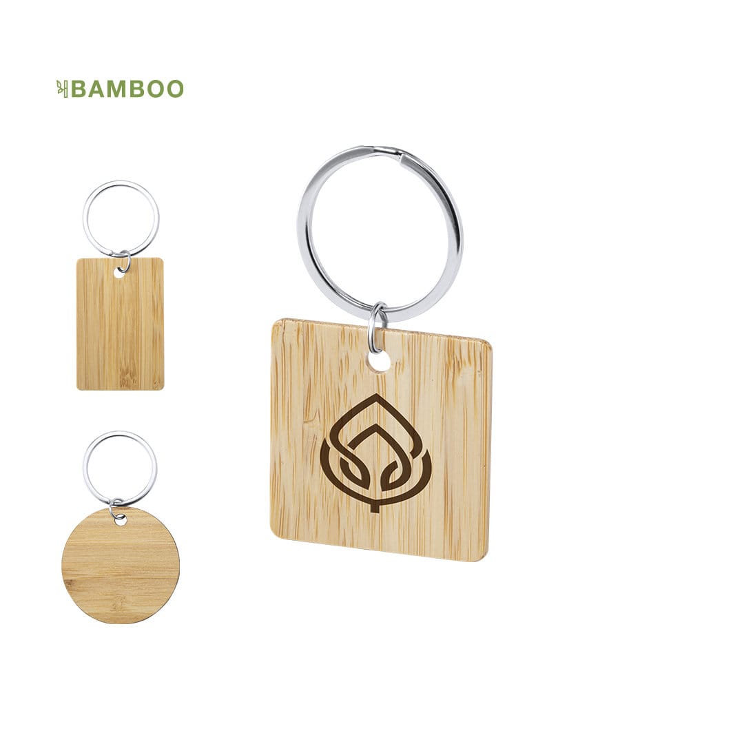 A bamboo keyring featuring a circular and square shape, with a polished silver keyring attachment and a logo. Sonek Keyring - Image 1