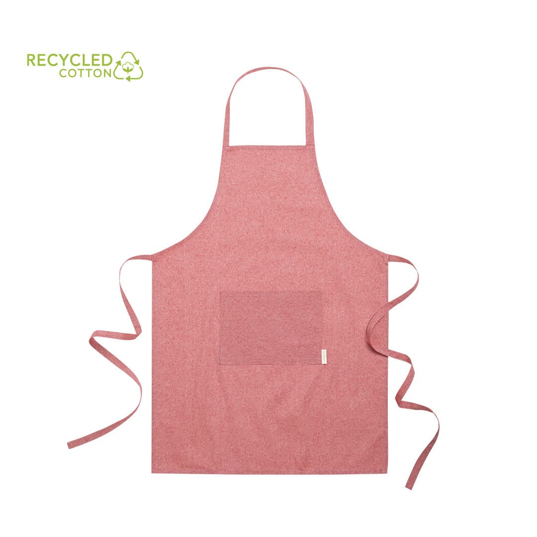 A pink apron made from recycled cotton, featuring a pocket and ties at the waist. It has a logo in the corner. Pissek Apron - Image 1