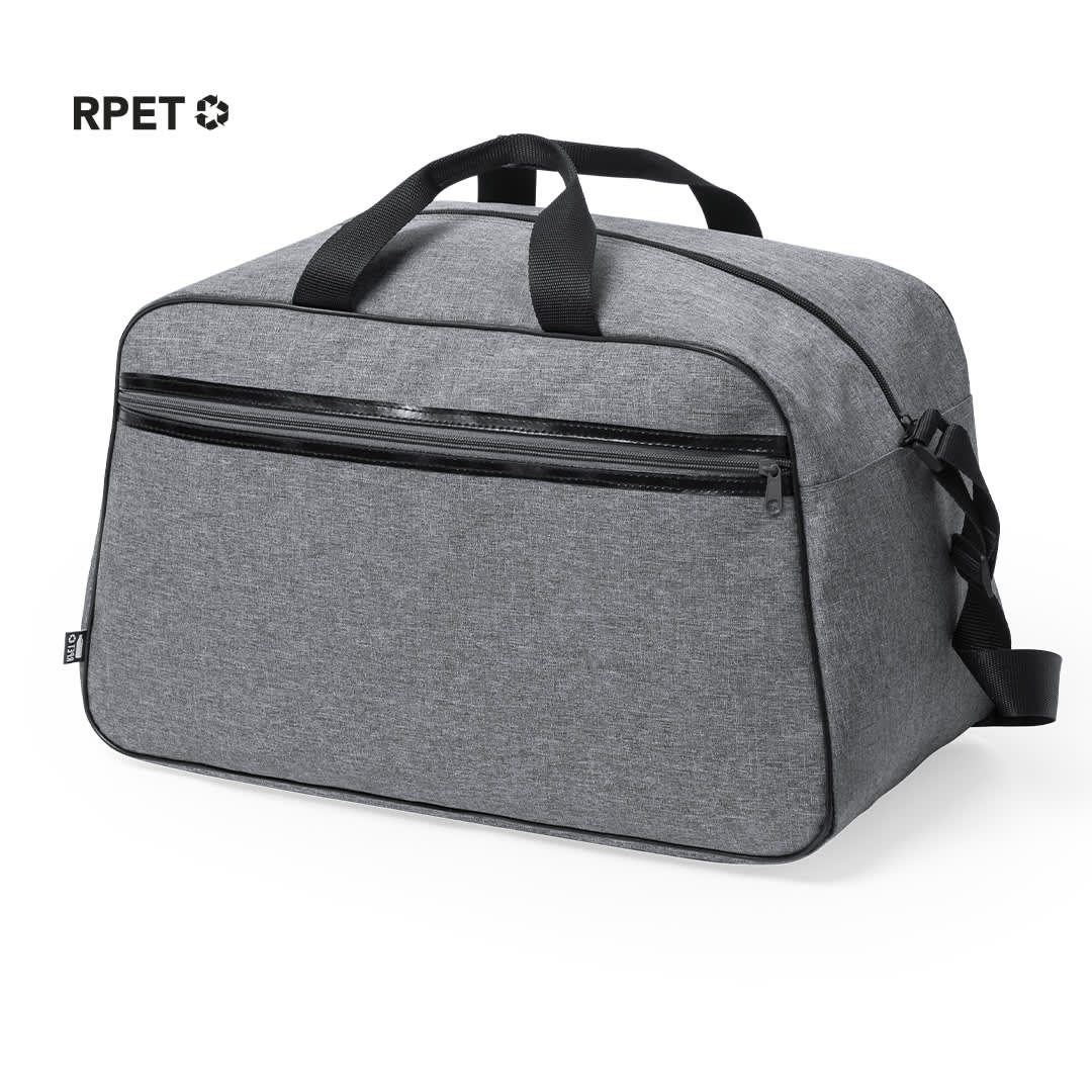 A grey bag with dual handles, a crossbody strap, and a front zippered pocket. It features a logo on the side. Holtrum Bag - Image 1