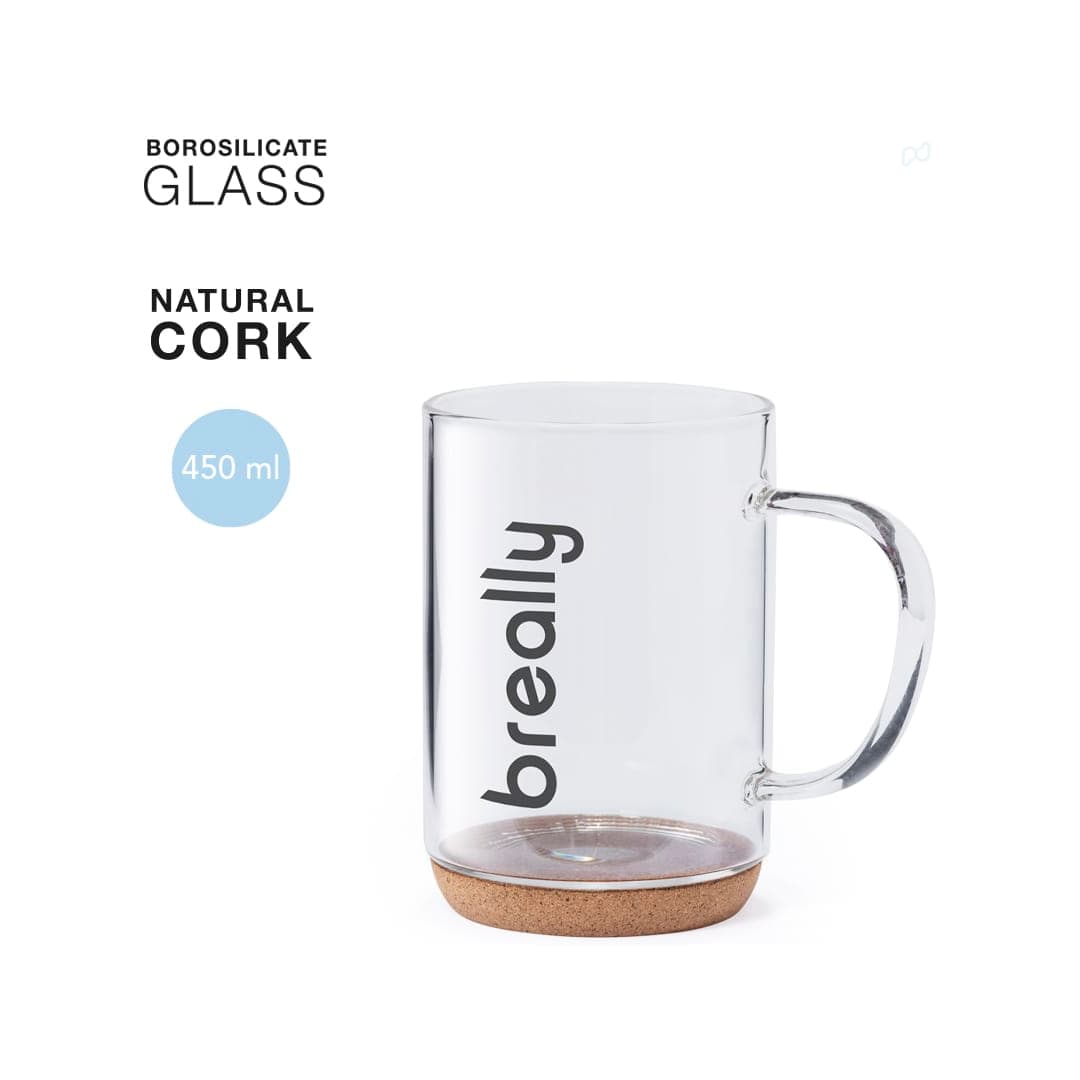 A transparent borosilicate glass mug with a natural cork base, featuring a handle and a branding logo. Hindras Mug - Image 1