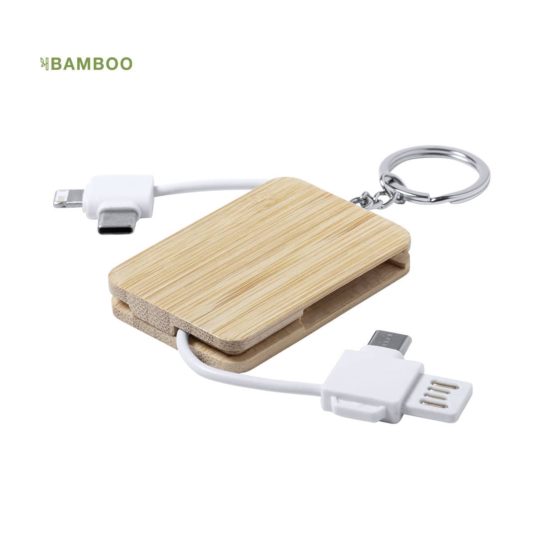 A bamboo charging cable keychain with white connectors for multiple devices. Features a small keyring attachment. Rusell Charging Cable - Image 1
