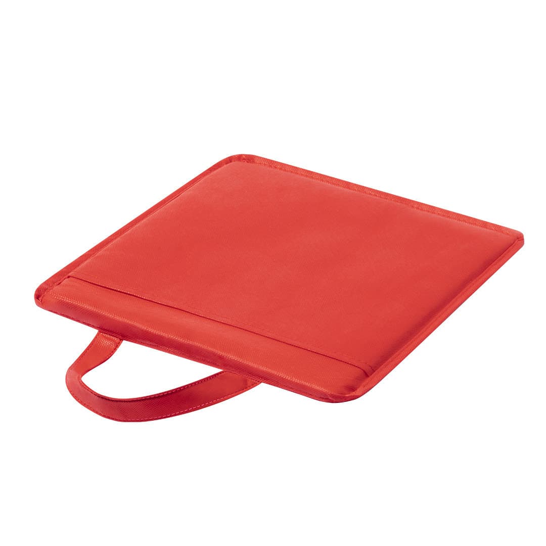 A red cushion with a handle, featuring a smooth surface and a simple design, ideal for home use. Rostel Cushion - Image 1