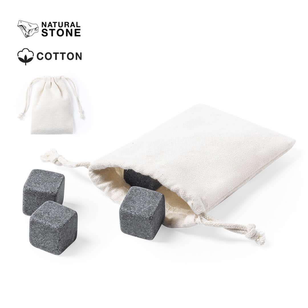A natural stone cooling set in a cotton bag, featuring four dark grey cubes. The bag is cream coloured. Laniax - Image 1
