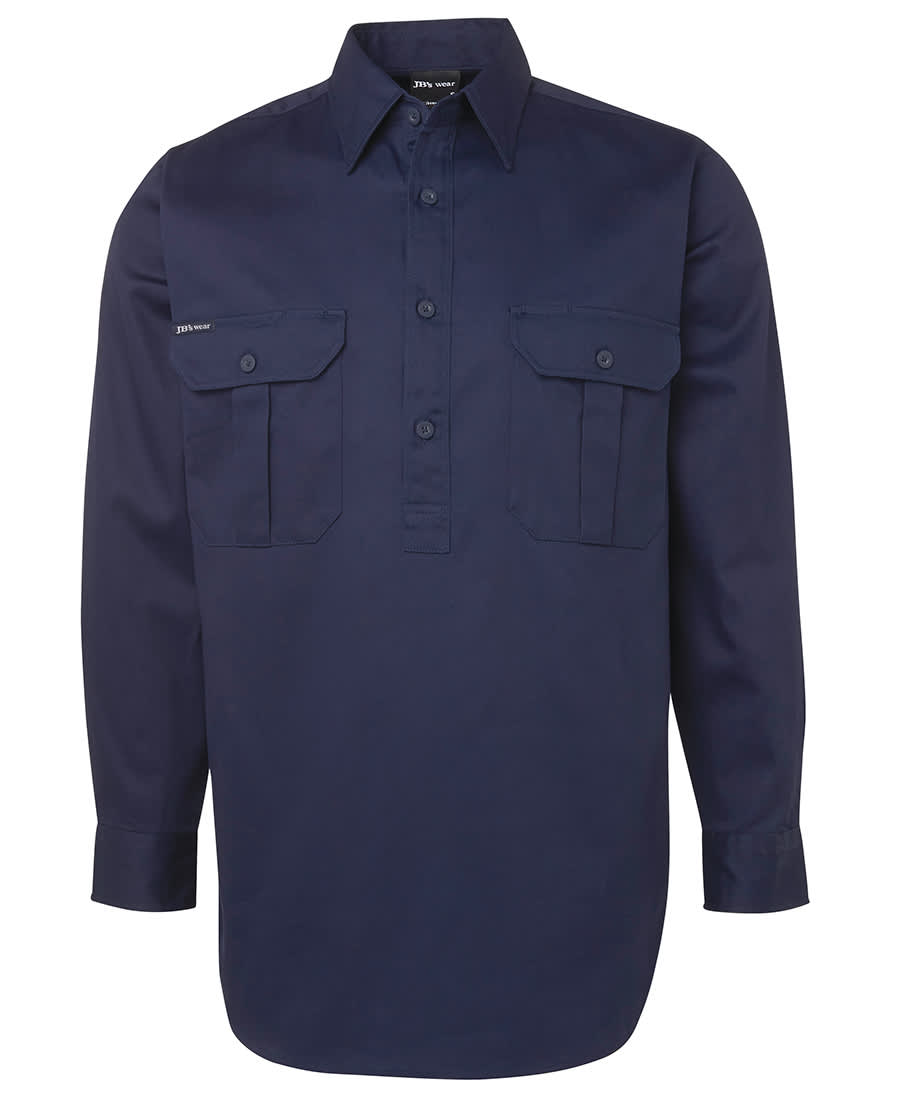 A long-sleeve navy work shirt featuring two front pockets and a collar, with a logo on the chest. JB's Close Front L/S Work Shirt - Image 1