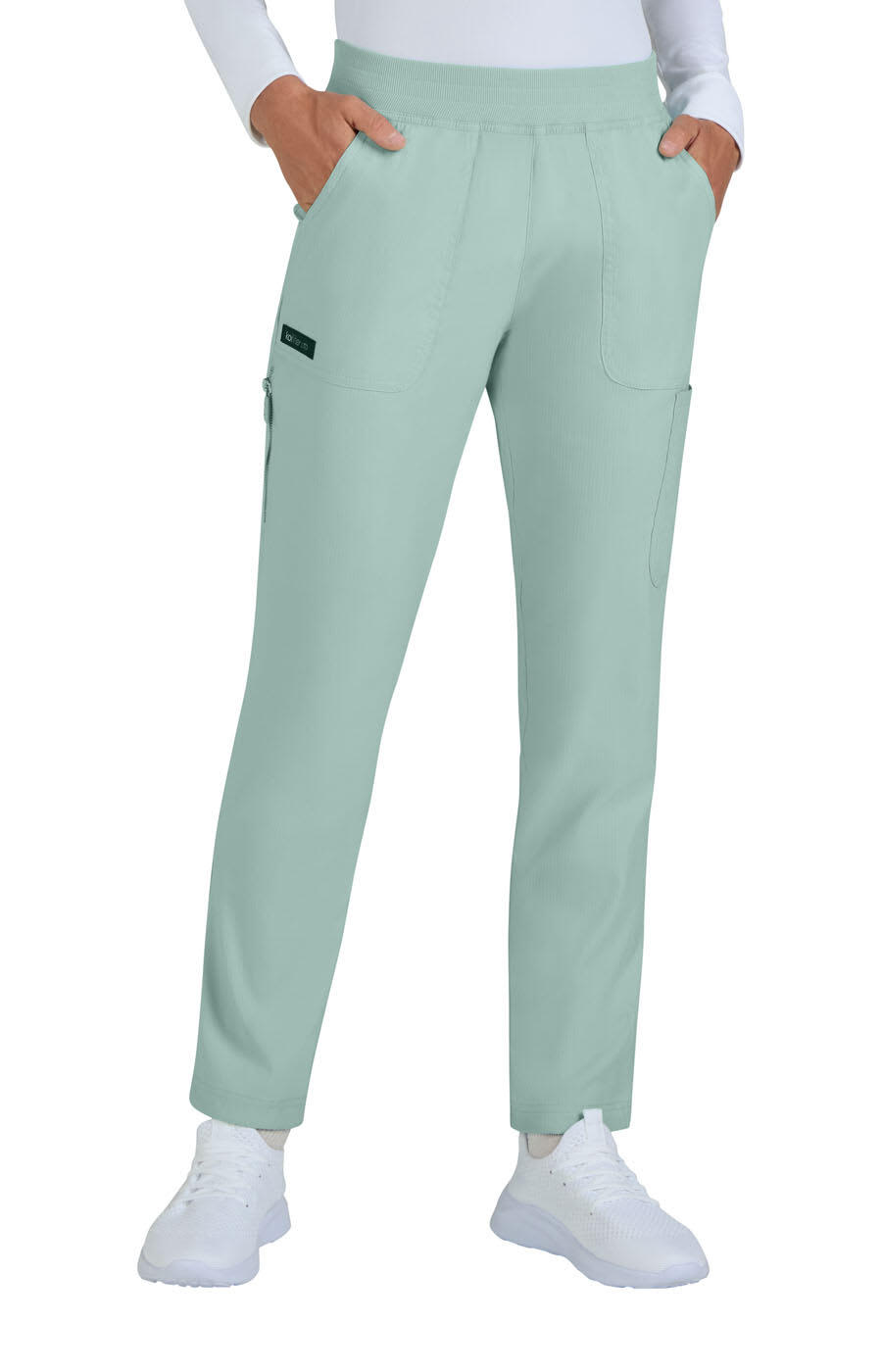 A pair of light green pants with pockets, featuring a subtle logo on the side. Harper Pant (Limited Edition) - Image 1