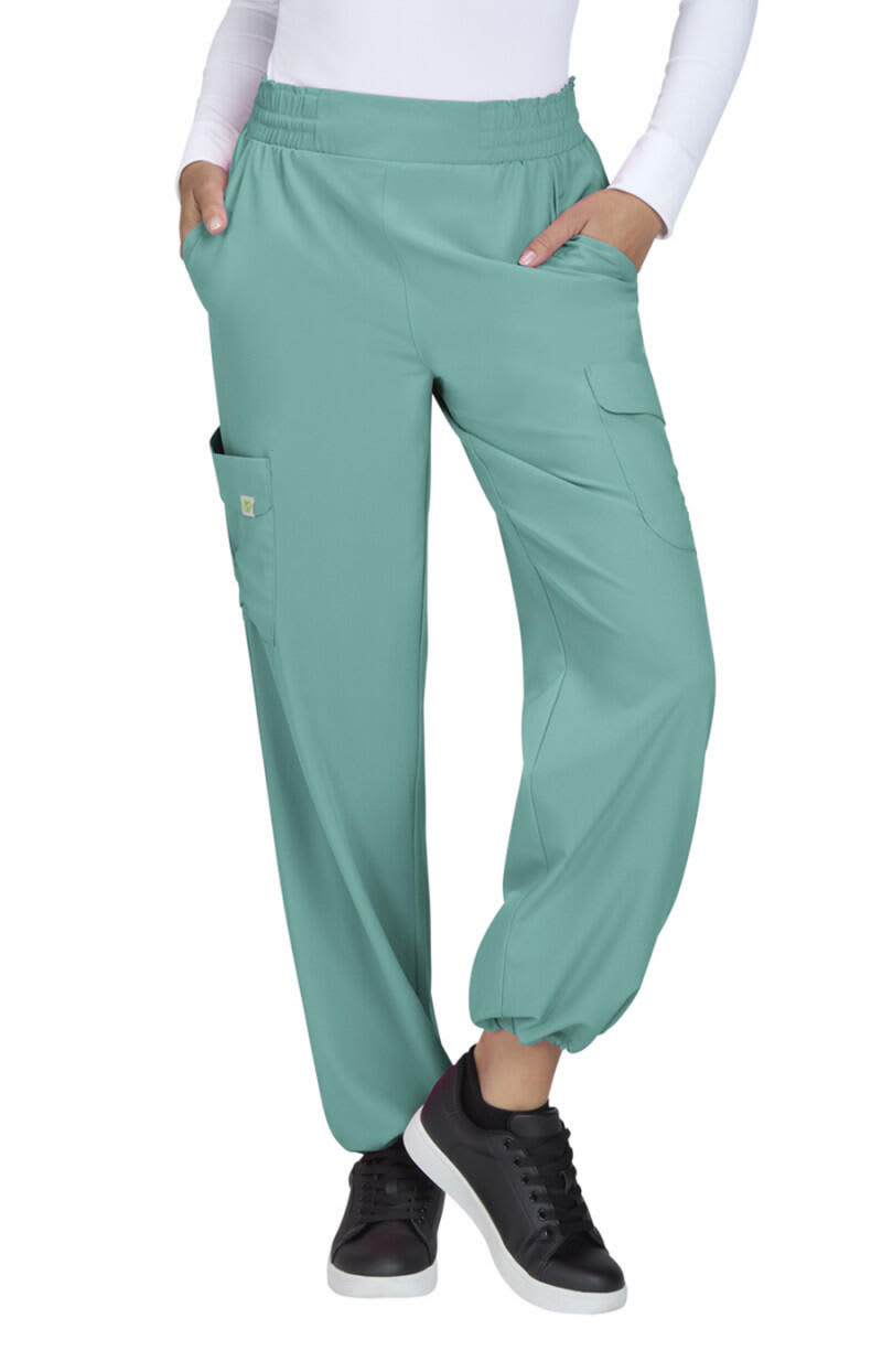 Ayla Pant in a light teal colour, featuring a relaxed fit, elastic waistband, and pockets on the sides. Ayla Pant - Image 1