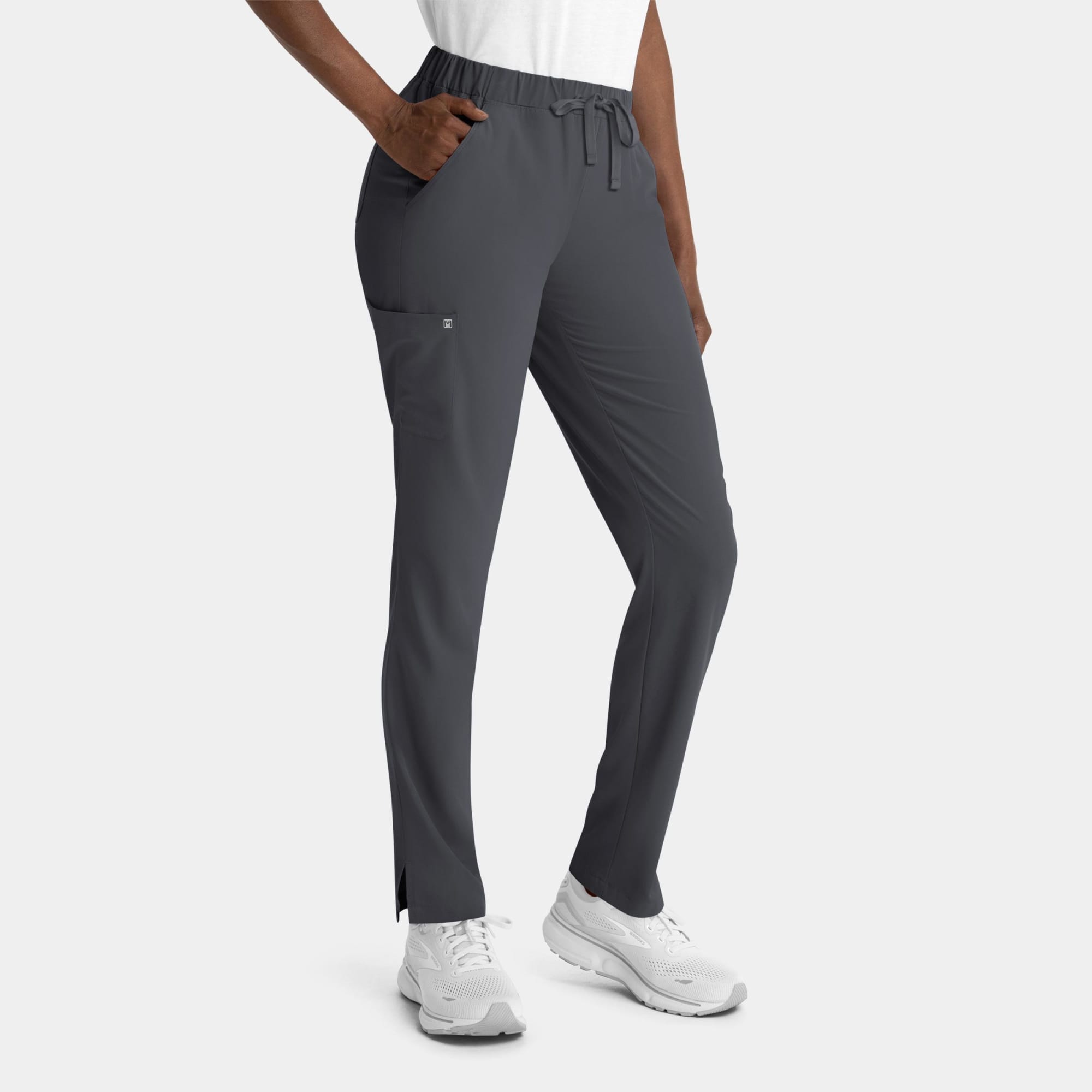 Grey women's skinny pull-on pants with pockets and a drawstring waist. Features branding on the garment. Matrix Impulse Womens Skinny Pull-On Pant - Image 1