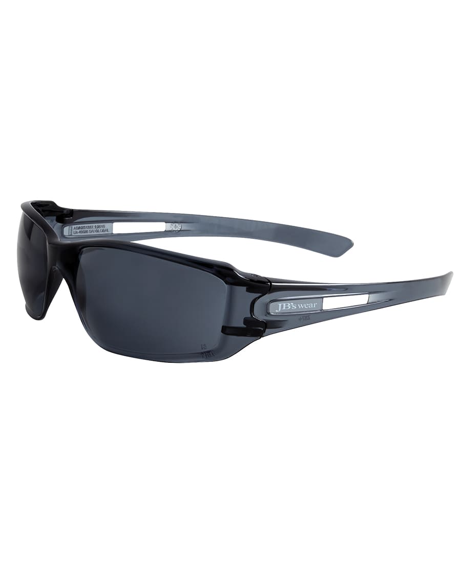 Sunglasses with a dark grey lens and black frames, featuring a logo on the side. JB's Power Spec 1337.1 (12 Pk) - Image 1