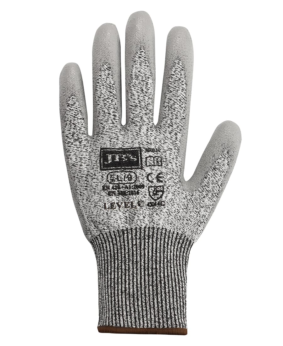 A grey cut-resistant glove with a knitted cuff and branding details. It features a textured grip surface. JB's Pu Breathable Cut Resist Level C Glove (12 Pk) - Image 1