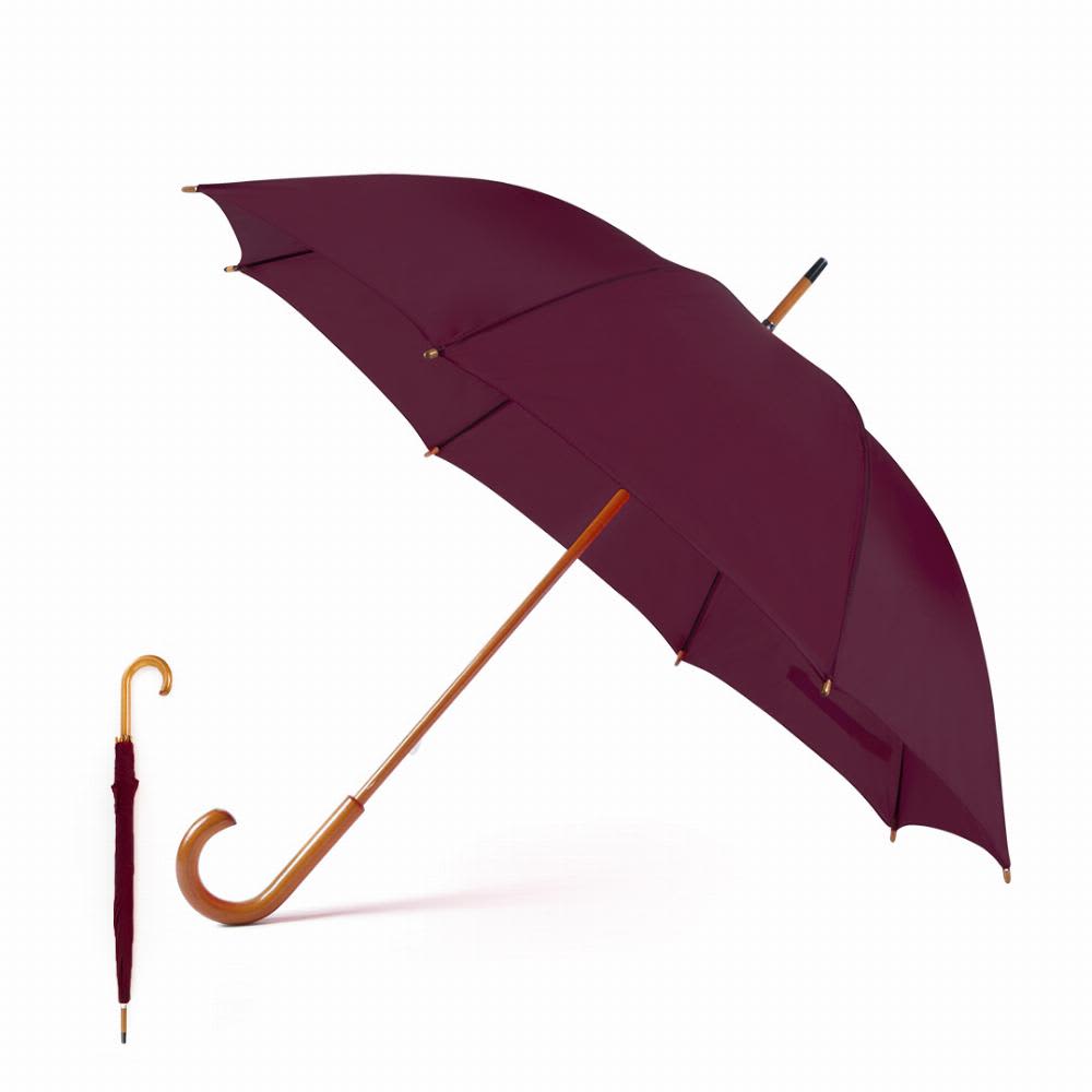 A burgundy umbrella with a wooden handle, along with a matching folded umbrella. Santy - Image 1