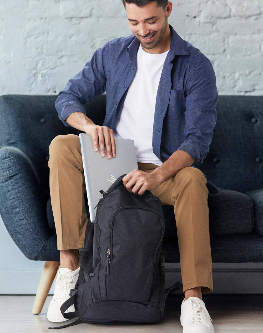 A black executive backpack featuring adjustable straps and mesh side pockets for storage. Excutive backpack - Image 1