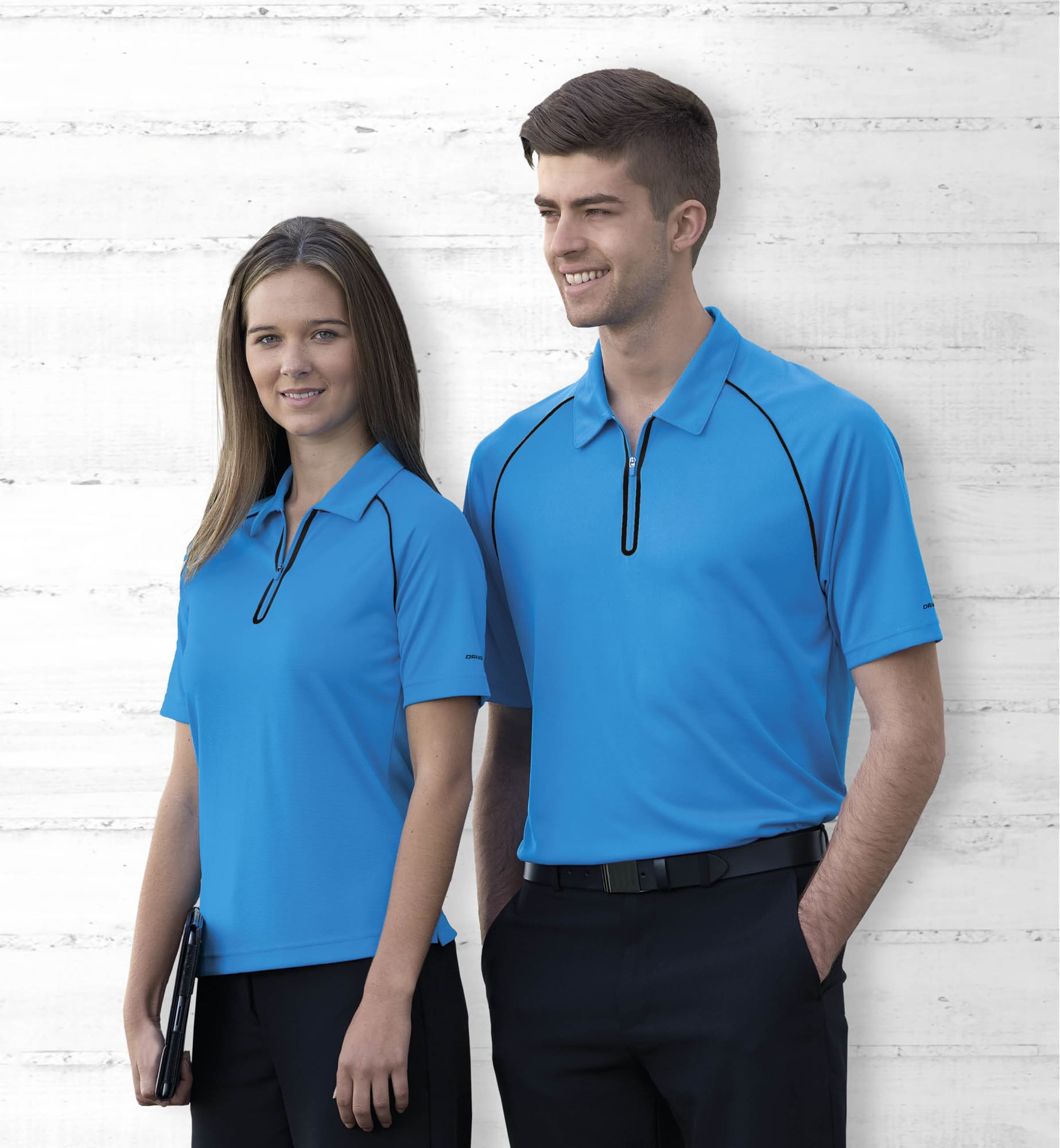 A blue Dri Gear Dimension polo shirt for men and women, featuring a zippered collar and subtle branding. Dri Gear Dimension Polo - Mens - Image 1