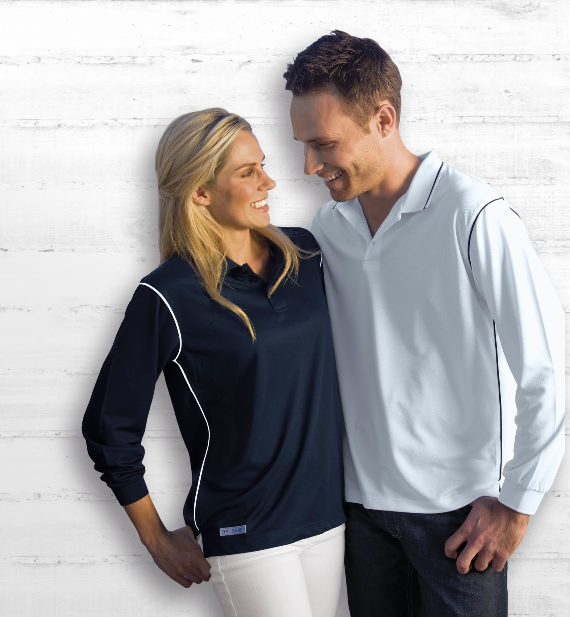 A navy blue and light blue long sleeve polo shirt with contrasting white piping and a logo. Dri Gear Long Sleeve Hype Polo - Image 1
