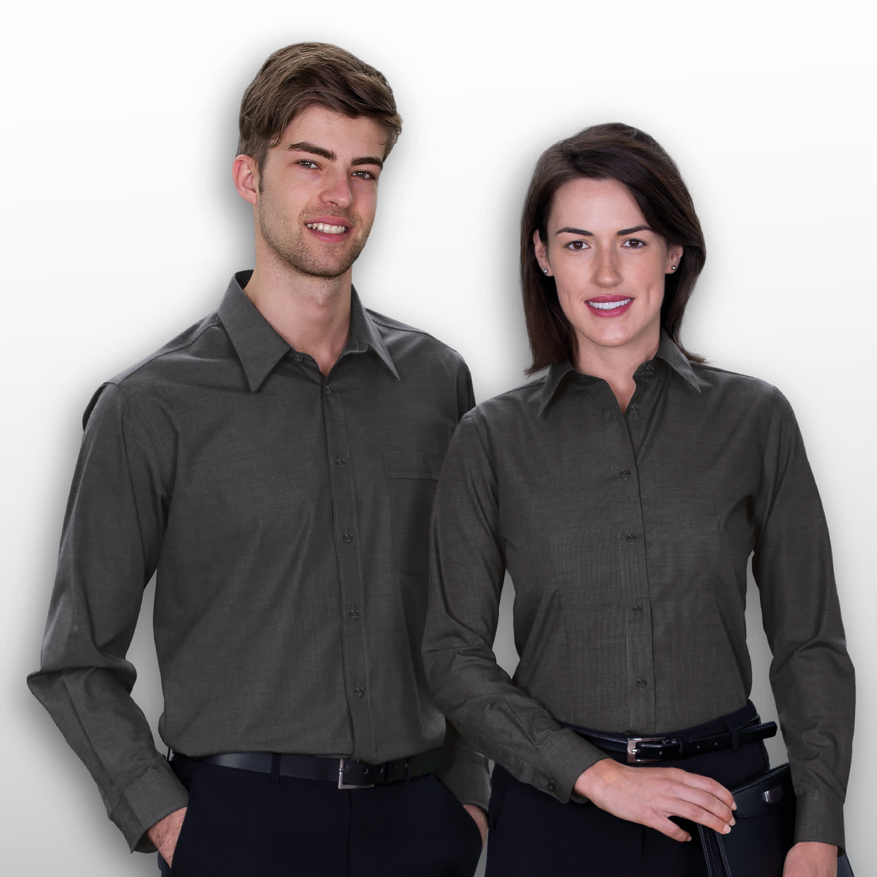 A grey button-up shirt for men and women, featuring a collar and long sleeves. The design includes a pocket and a logo. The End on End Shirt - Mens - Image 1