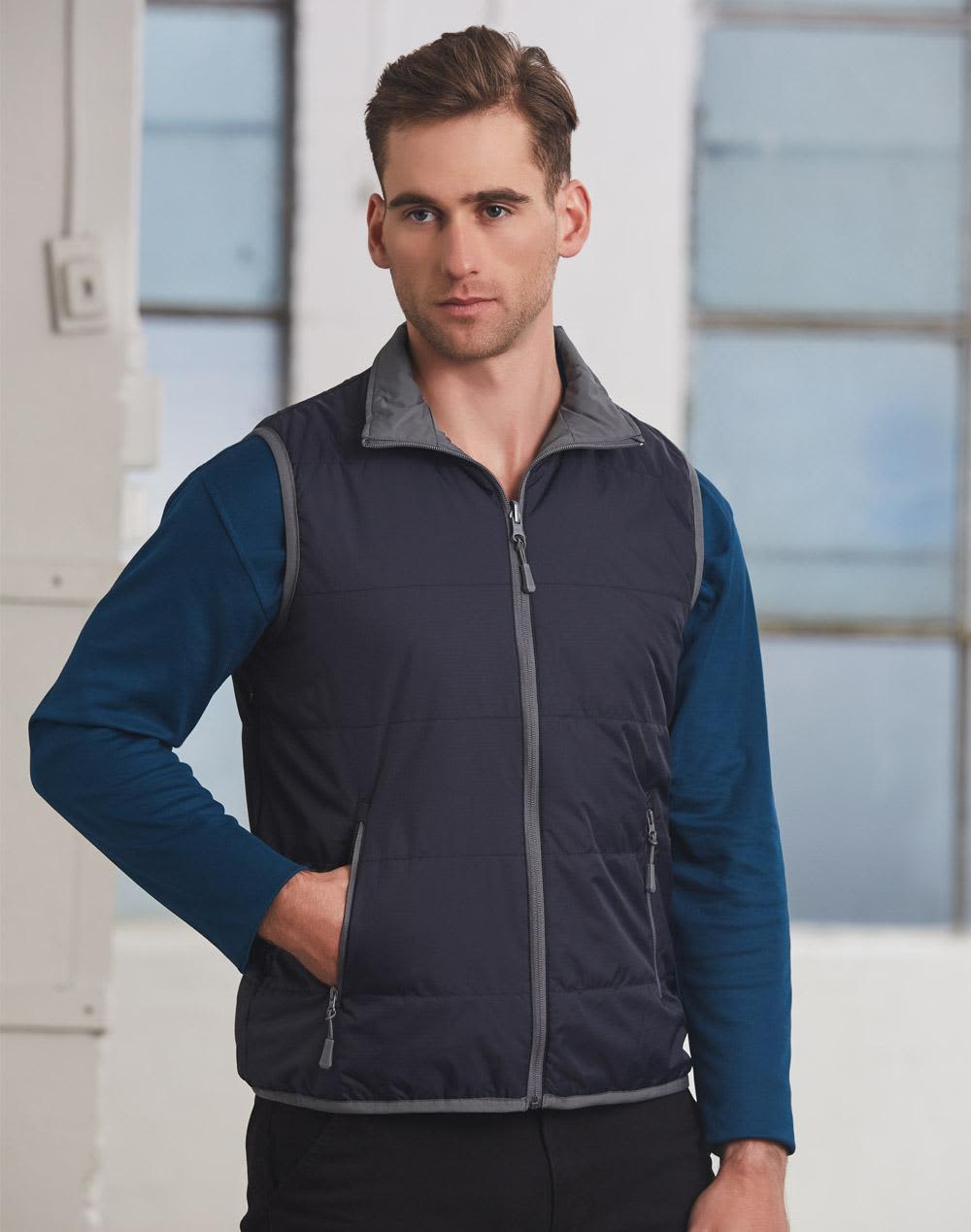 A navy blue men's vest with grey accents, featuring a zip front and pockets. Men's Versatile Vest - Image 1