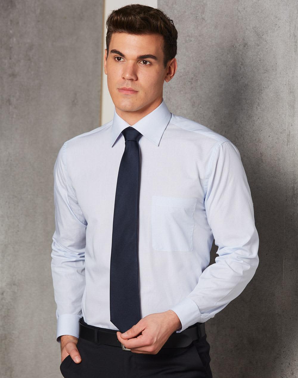 A light blue long sleeve button-up shirt featuring a single chest pocket and paired with a dark tie. Men's Mini Check Premium Cotton Long Sleeve Shirt - Image 1