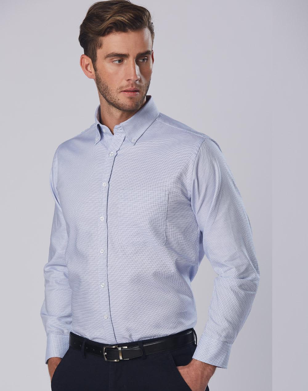 A long sleeve button-up shirt in light blue with a dot contrast pattern and a single chest pocket, featuring a logo. Men's Dot Contrast Long Sleeve Shirt - Image 1
