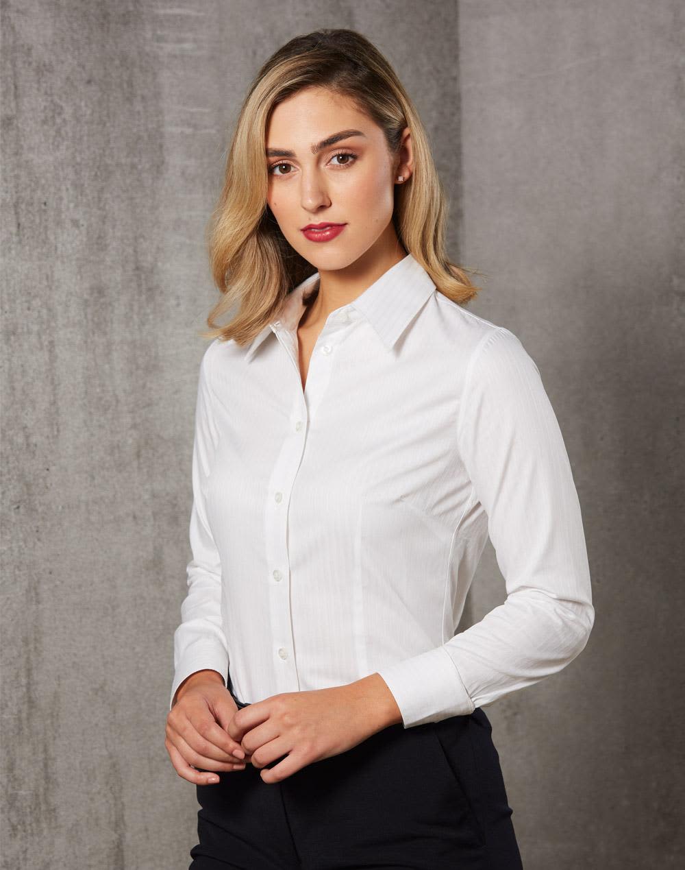 A white long-sleeve button-up shirt for women featuring self-stripe design, with a collar and button closure. Women's Self Stripe L/S Shirt - Image 1