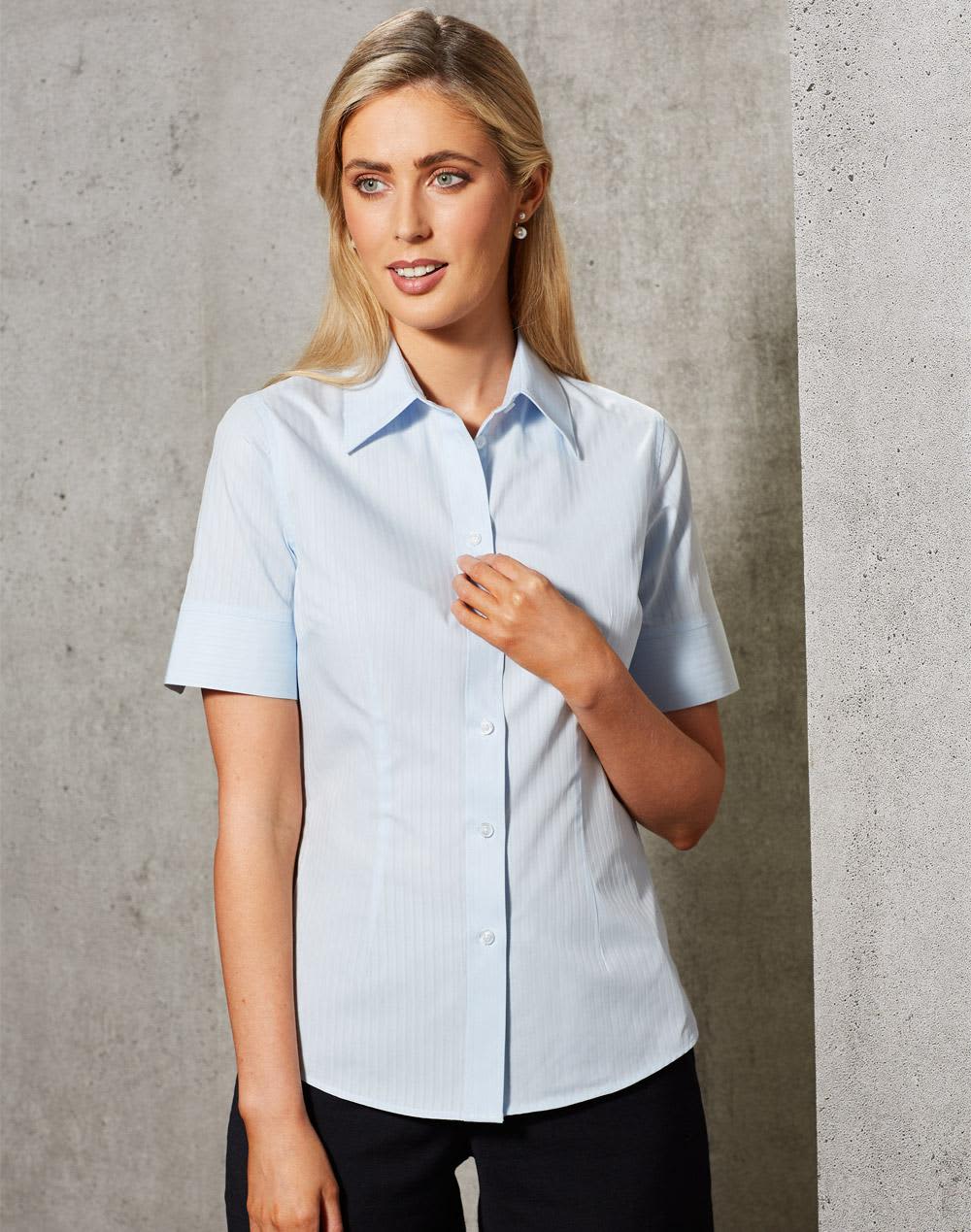 A light blue women's short-sleeve button-up shirt with a self-stripe pattern, featuring a classic collar and a sleek fit. Women's Self Stripe S/S Shirt - Image 1