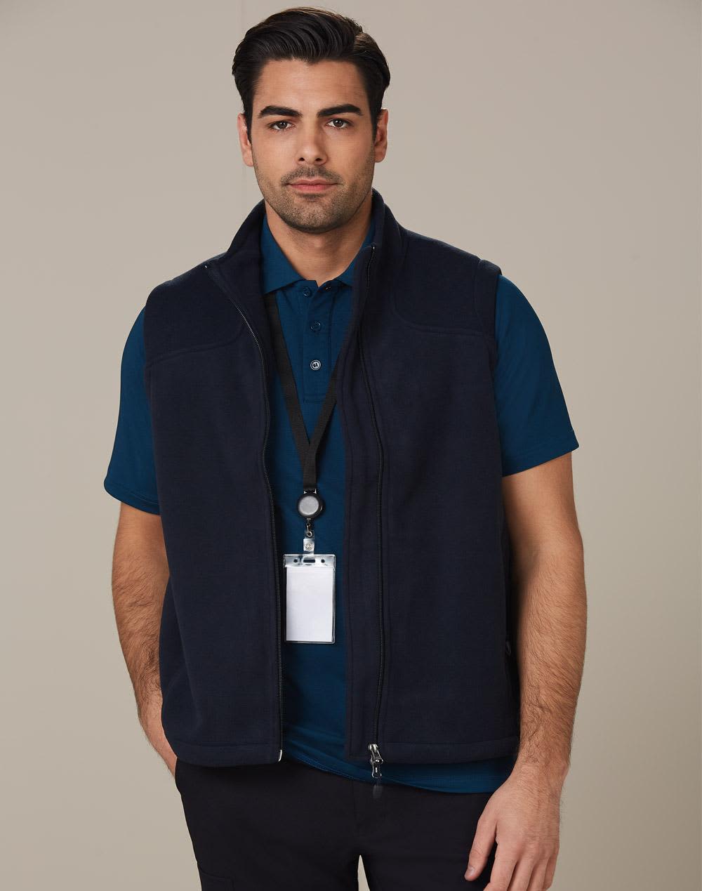 A navy diamond fleece vest for men, featuring a zip front, pockets, and a branded logo. Man's bonded polar fleece vest - Image 1