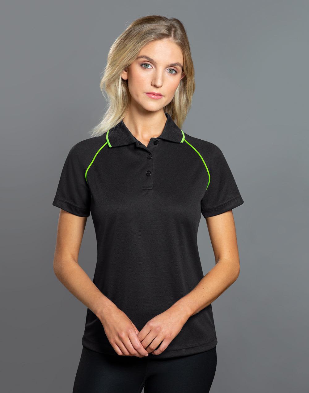 A black ladies polo shirt with green accents, featuring a collar and buttons, and a logo. ladies cooldry raglan S/S polo - Image 1