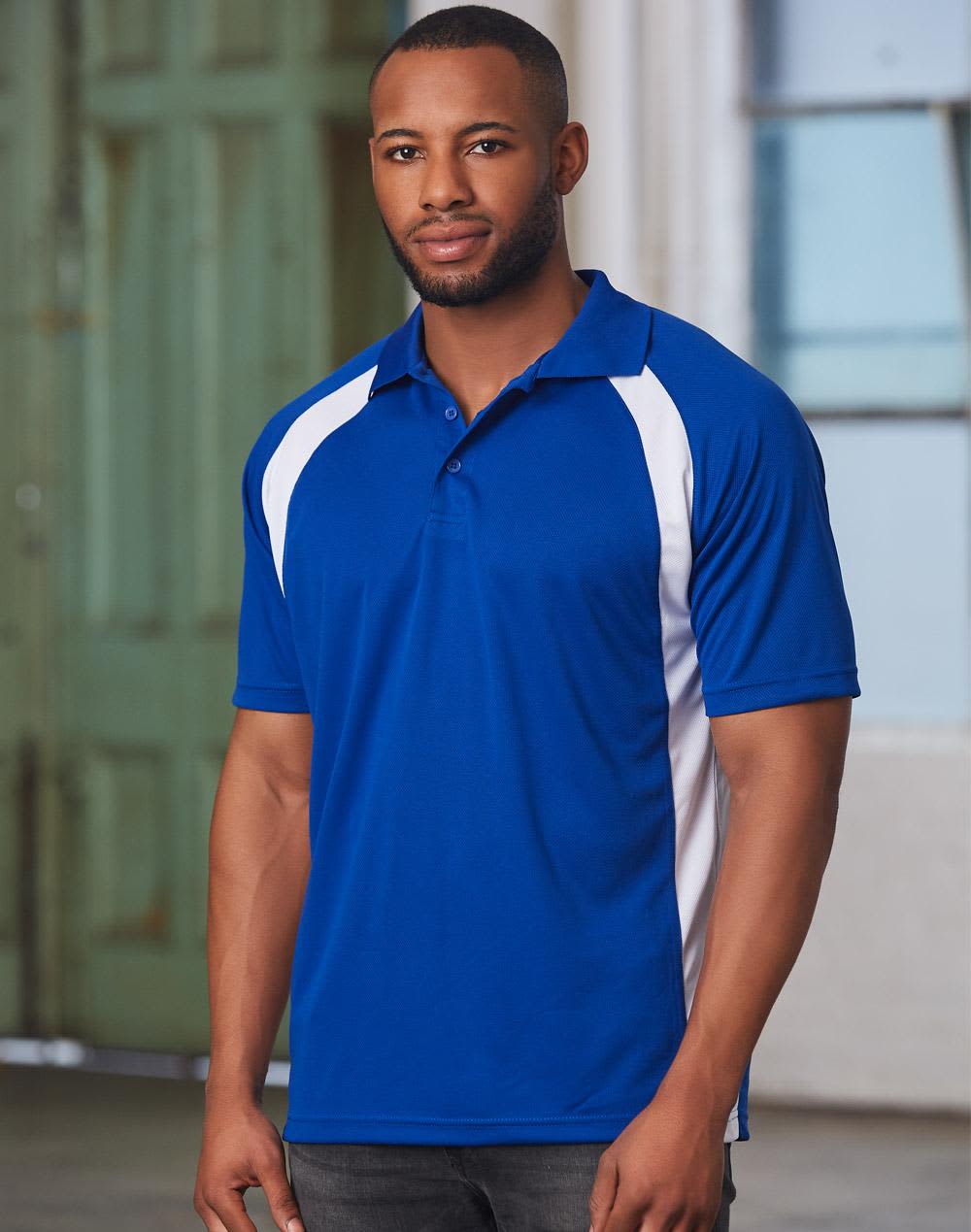 A blue men's polo shirt featuring white side panels and a collar, displayed on a male model. Men's CoolDry Micro-mesh Contrast Colour Polo - Image 1