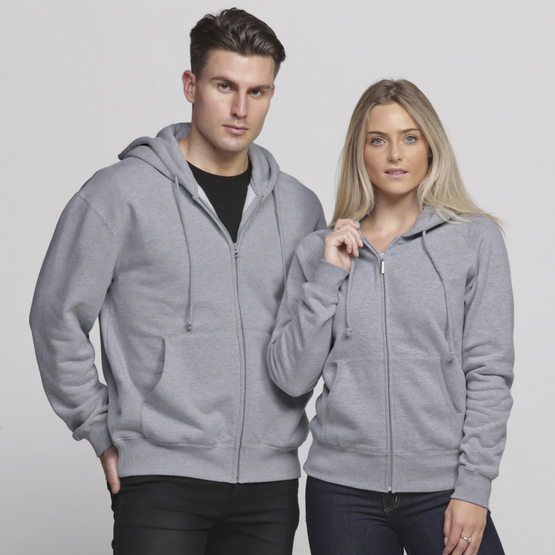 A grey vintage hoodie featuring a zip front, worn by a male and female model, each with pockets and hoods. smpli Mens Vintage Hoodie - Image 1