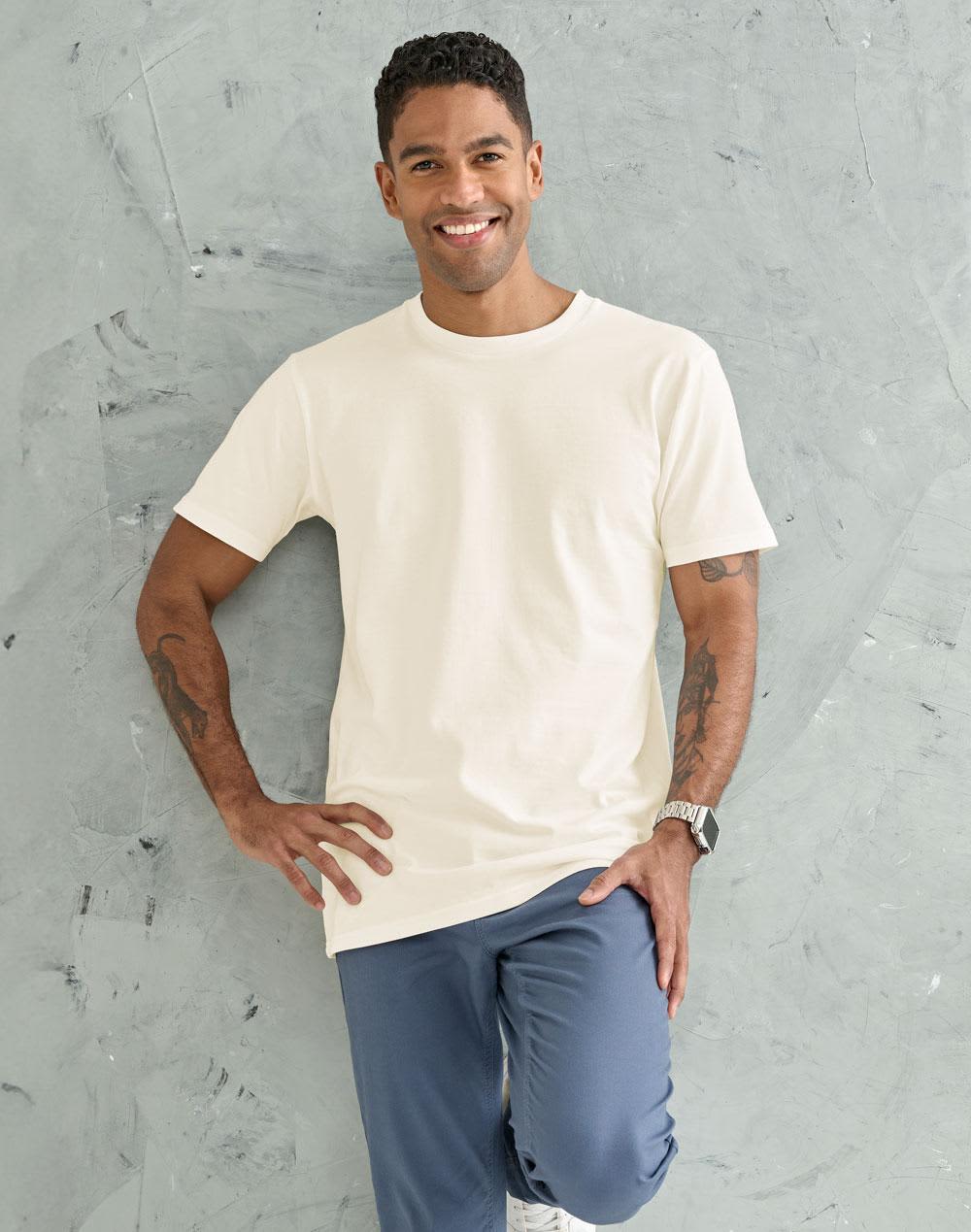 A black premium cotton t-shirt displayed on a model, featuring short sleeves and a round neckline. Men's Premium Cotton Tee - Image 1