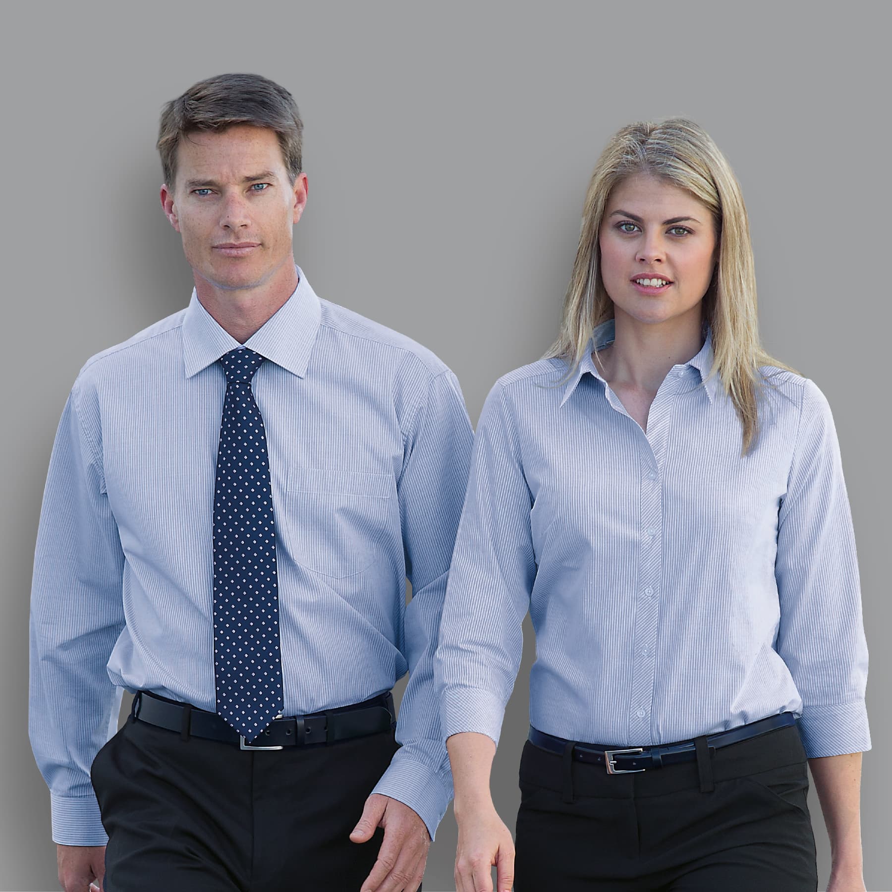 A button-up shirt for women in light blue, featuring a sleek design and a logo. The Urban Mini Rectangle Shirt - Womens - Image 1