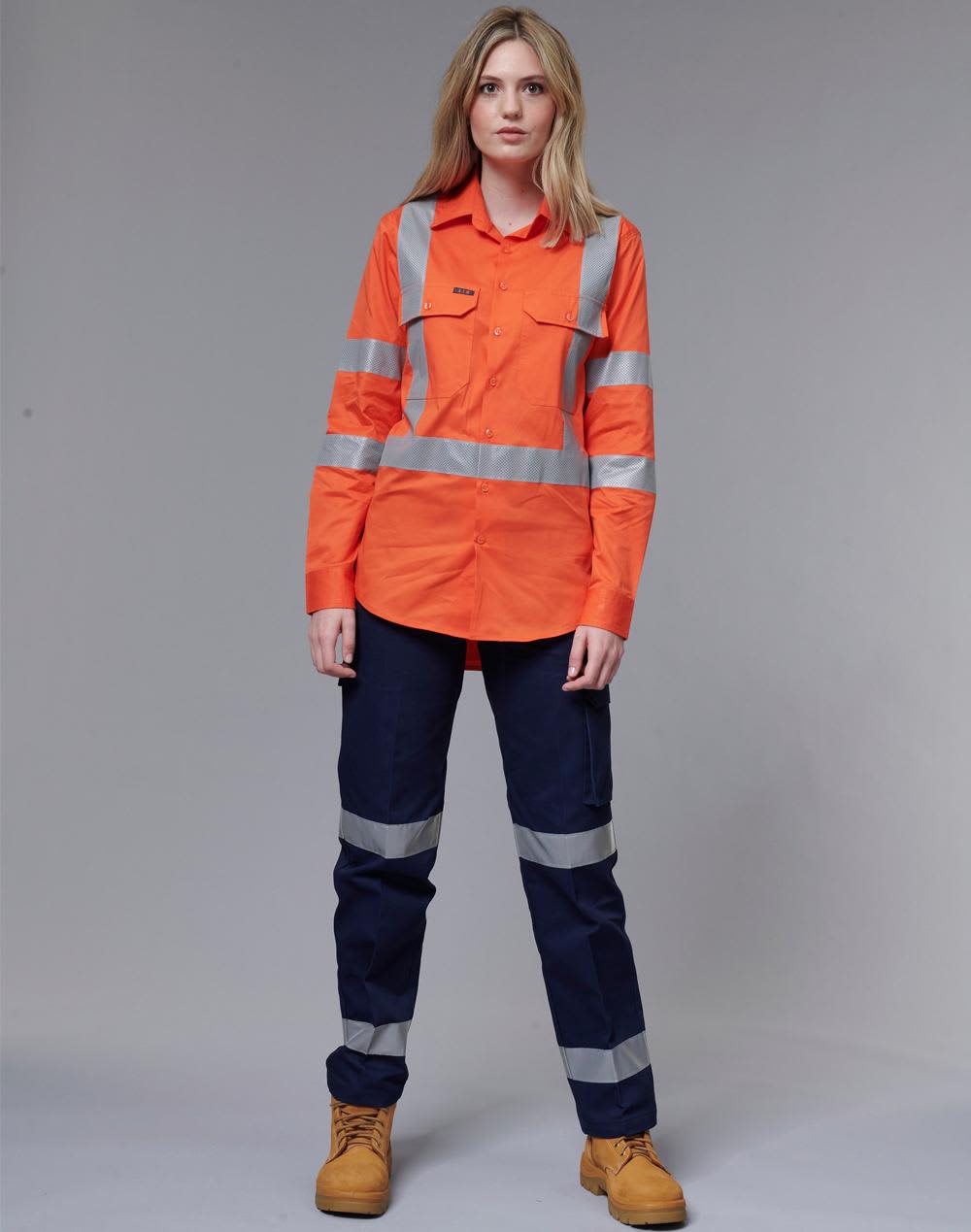Ladies' heavy cotton drill pants in navy with 3M reflective tape. Model wears a matching high-visibility orange shirt. Ladies' Heavy Cotton Pre-Shrunk Drill Pant with 3M Tape - Image 1