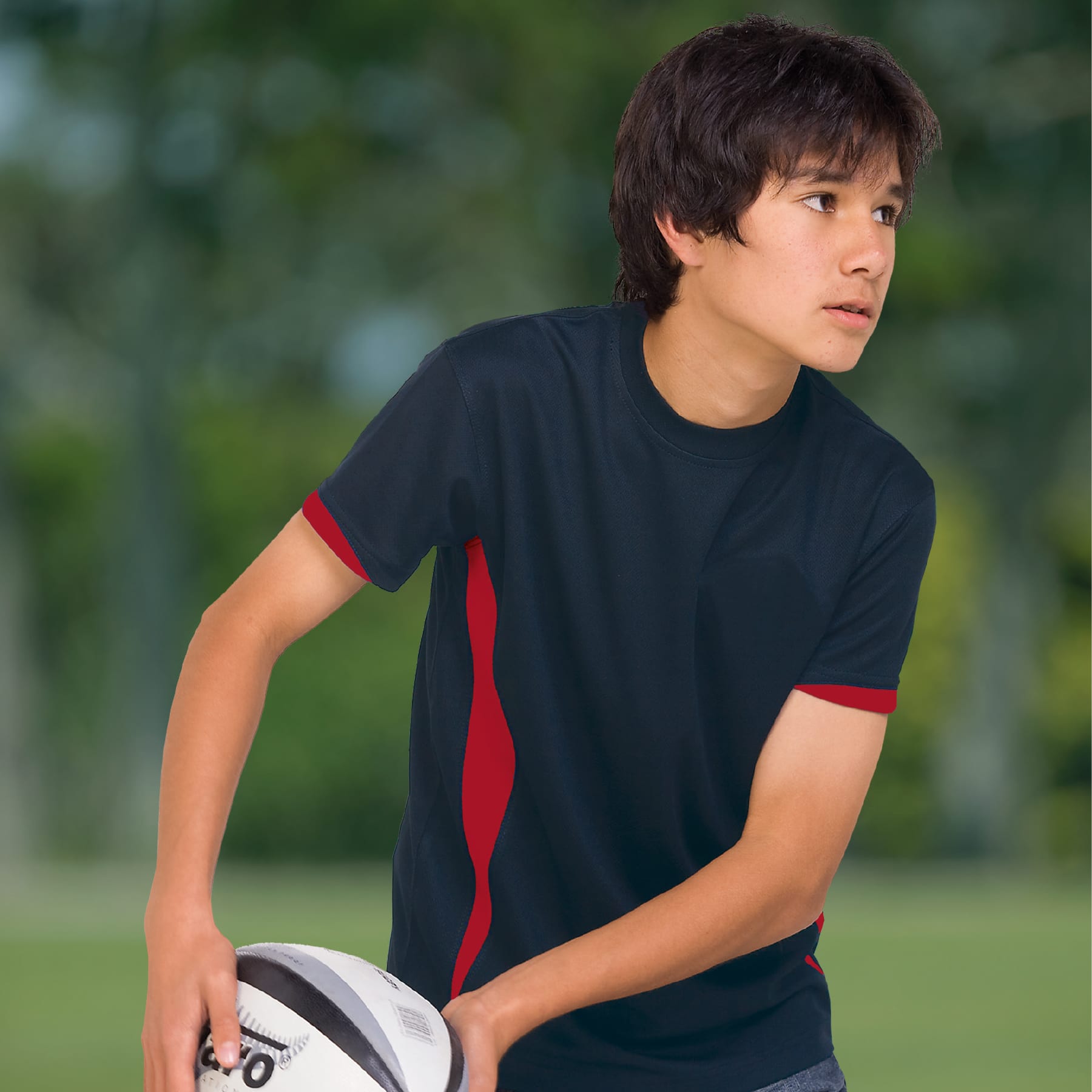 A youth T-shirt in navy with red accents, featuring a logo, designed for active wear. Youth Dri Gear Zone Tee - Image 1