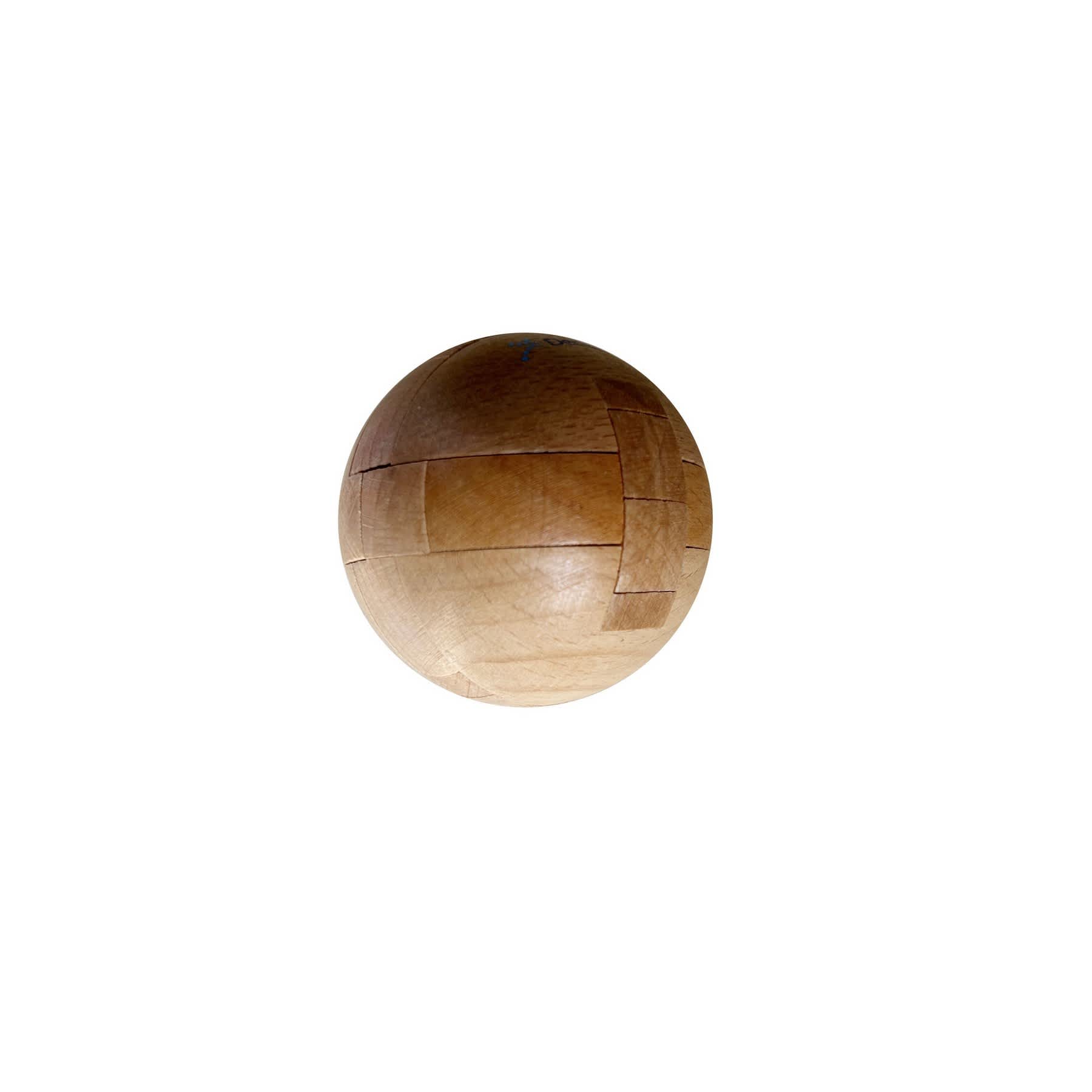 A wooden puzzle ball with interlocking pieces, featuring natural wood hues and a smooth surface. Puzzle Magic Ball - Image 1