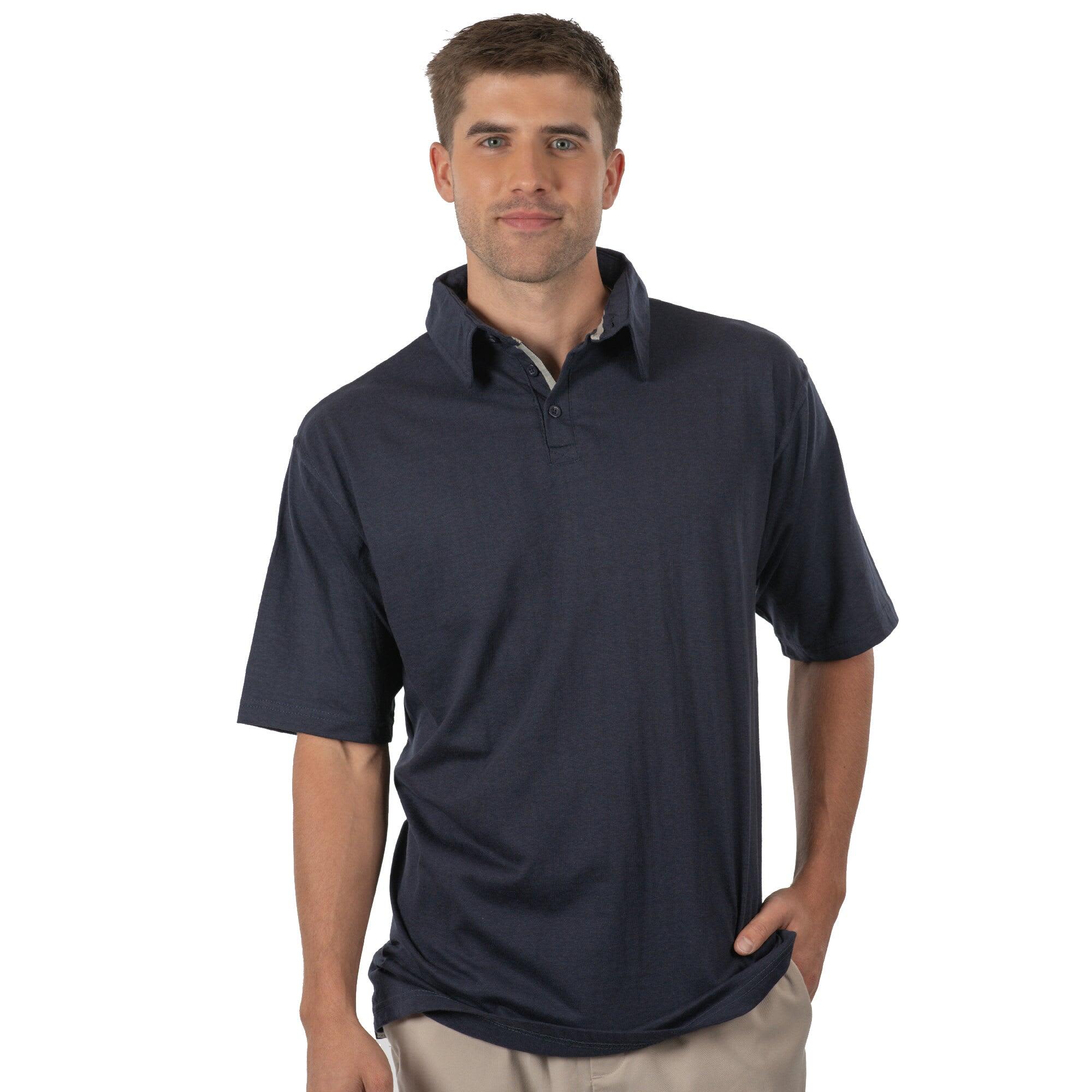 A navy blue polo shirt with a collar and short sleeves, featuring a subtle logo on the chest. The Fader Play Polo - Image 1