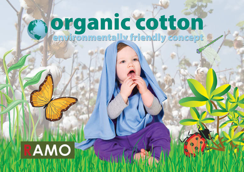 A child wearing blue baby pants and a blue hooded top, surrounded by cotton plants, butterflies, and greenery. Baby Blanket - Image 1