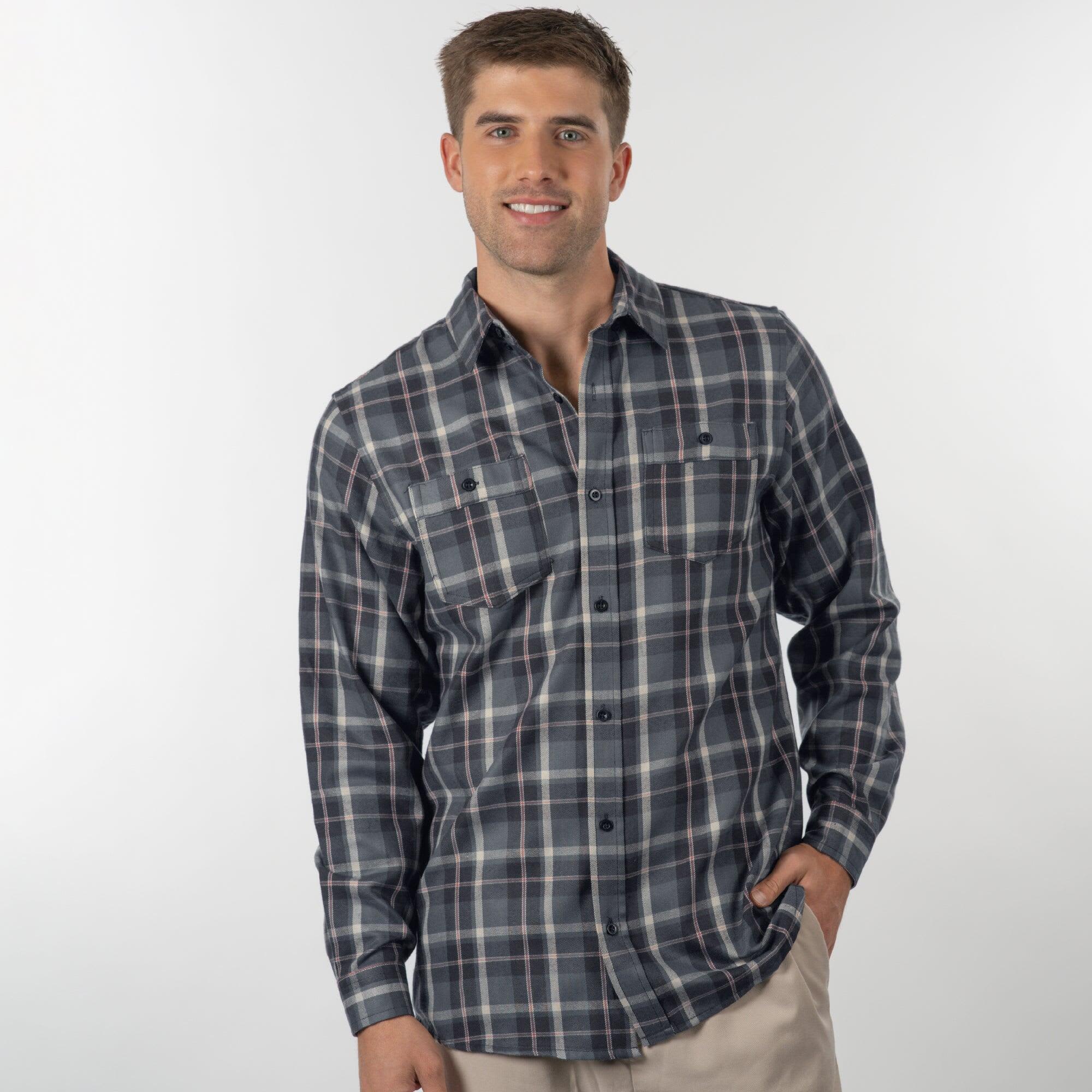 A flannel shirt in grey and blue plaid, featuring two chest pockets and a button-up front. Includes a logo. Flannel Shirt - Image 1